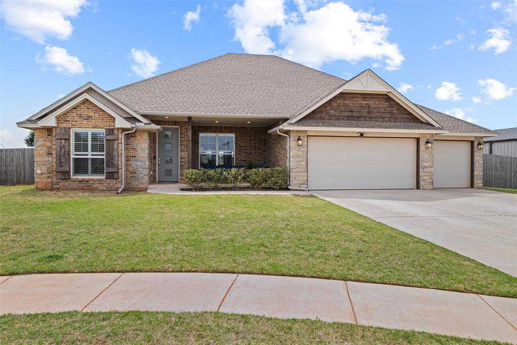 Located in the sought-after Crystal Hill Estates and within the highly desirable Mustang School District, this beautifully designed 2023 home offers the look and feel of new construction without the premium price. Situated on just over half an acre with shop approval, this property delivers the space, flexibility, and lifestyle today’s buyers are searching for. Inside, you’ll find a thoughtfully designed split floor plan featuring four bedrooms and two and a half bathrooms, with the primary suite privately positioned away from the secondary bedrooms. The main living areas are anchored by durable wood-look ceramic tile, while the kitchen serves as a true centerpiece with granite countertops, a built-in cooktop, custom vent hood, designer backsplash, and a clean, elevated finish palette throughout. The primary suite offers a true retreat with a five-piece bath that includes dual vanities, a soaking tub, a walk-in shower, and a spacious walk-in closet. Plantation shutters throughout much of the home add both charm and function, elevating the overall feel of the space. Enjoy quiet mornings on the covered front porch and relaxed evenings on the covered back patio overlooking the expansive backyard. Residents of Crystal Hill Estates also enjoy access to neighborhood amenities including a community pool, fitness center, and playground, adding to the overall lifestyle appeal. Don’t miss the opportunity to own a nearly new home with modern finishes, a functional layout, and room to grow in one of the area’s most desirable communities. Schedule your private showing today!