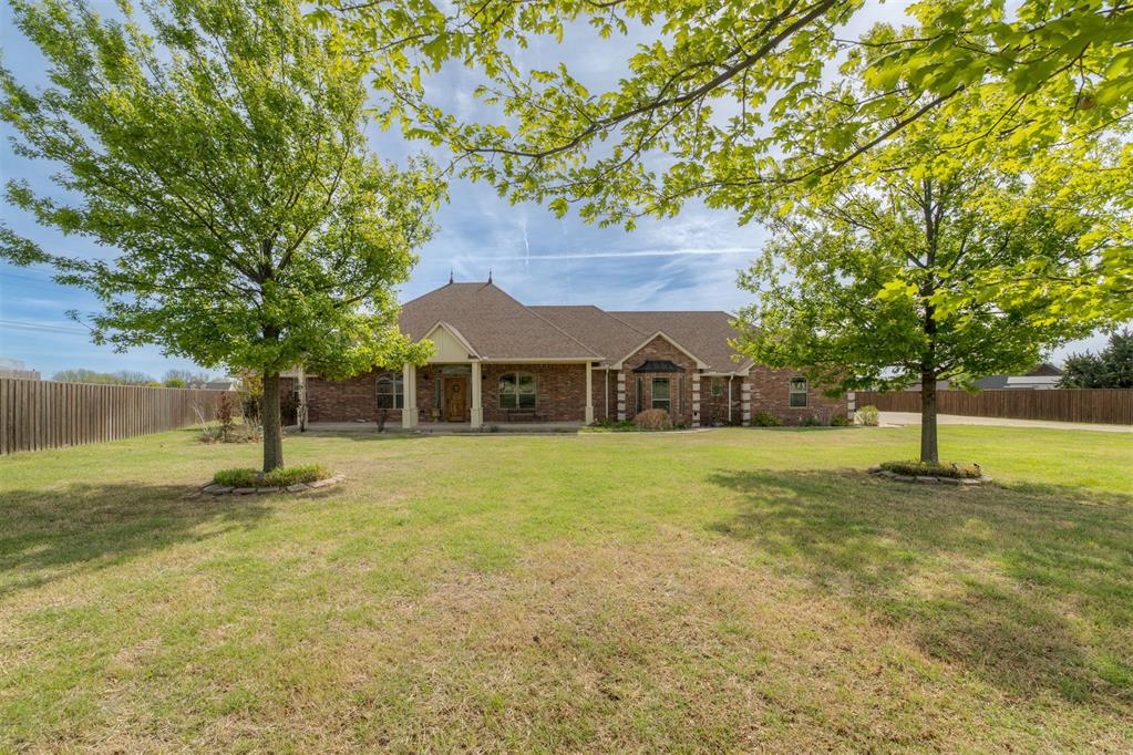 If you’ve been looking for that balance between space, comfort, and convenience - this is it. Situated on a full acre in the Moore School District, this one-owner home offers room to spread out while still being just a short drive to Mustang and the shopping and dining of southwest Oklahoma City.From the moment you walk in, the wood flooring that carries through the main living spaces, office, and primary bedroom sets the tone for a warm, inviting interior. The layout is designed with both everyday living and hosting in mind, featuring a dedicated office and a large dining area that easily accommodates gatherings. At the center of the home, the kitchen was built to be both functional and impressive, complete with high-end appliances, granite countertops, a large pantry, and double islands with separate prep sinks that make cooking, entertaining, or just spreading out effortless.The primary suite is privately positioned, while the secondary bedrooms are thoughtfully designed with their own individual vanities and sinks, connected by a shared bath space - offering both privacy and practicality.An oversized laundry room with a soaking sink and folding space adds to the home’s functionality, while construction details like 2x6 exterior walls and wrapped gutters provide long-term value. Step outside and you’ll find exactly what you’d expect from an acre setting - a large covered back patio for relaxing or entertaining, and a spacious front porch that’s perfectly positioned to take in those Oklahoma sunsets.