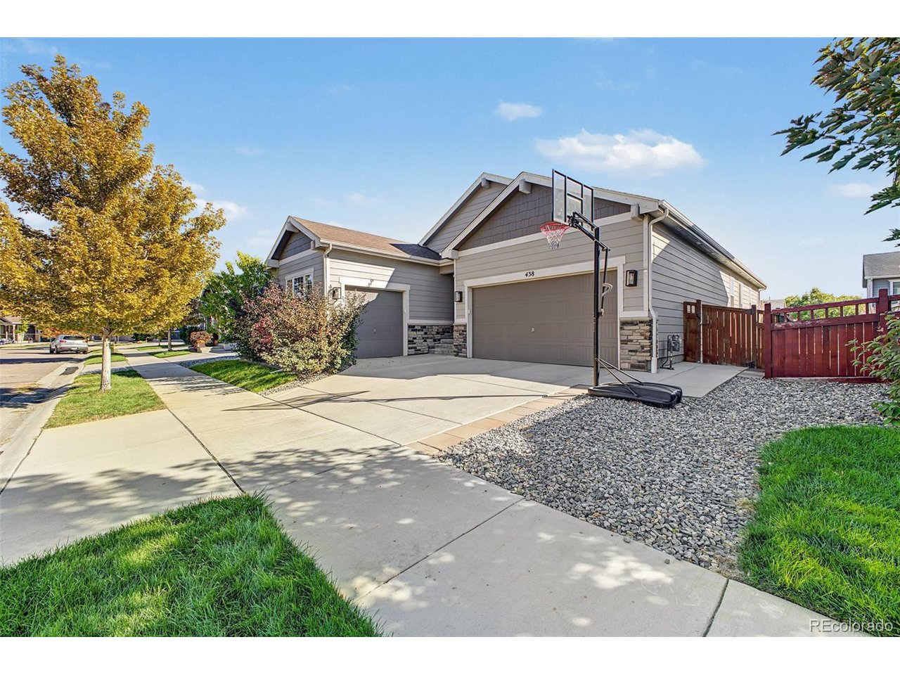 The kind of home that feels right from the moment you walk through the door! Built in 2019, this ranch-style home offers an inviting open floor plan, spacious kitchen, LVP flooring, and a cozy gas fireplace. The kitchen is truly the heart of the home, featuring stainless steel appliances, double ovens, a gas range, 42-inch cabinetry, a large island, and a walk-in pantry.The main-level primary suite offers a comfortable retreat with a spacious walk-in closet and luxurious five-piece bath. An additional bedroom, study/non-conforming bedroom, and convenient main-level laundry complete the first floor.Downstairs, the finished basement provides even more space to spread out, with a generous recreation area, workout space, bedroom, 3/4 bath, and built-in mini bar-ideal for movie nights, entertaining, or hosting guests.Outside, the low-maintenance backyard is designed for easy living, with turf, established landscaping, a covered patio, deck, and drip irrigation. Tucked away on a quiet cul-de-sac and just a short walk from the community pool, this home makes it easy to enjoy the outdoors and connect with the neighborhood. The three-car garage adds plenty of room for vehicles, gear, and storage.Conveniently located in Brighton near parks, recreation, shopping, dining, and everyday amenities, 438 Iris St. offers the space, functionality, and comfort you've been looking for. Come see it for yourself-you may just feel right at home.