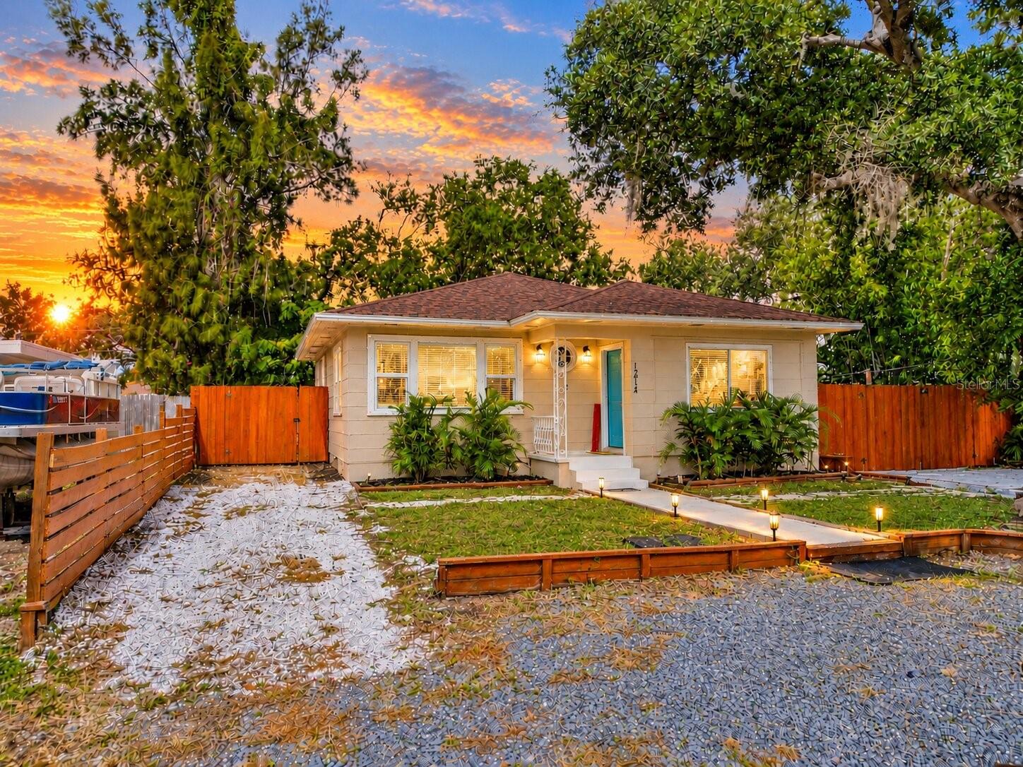 Welcome to 1214 Aloha Lane in Clearwater! This completely updated property offers a unique combination of modern finishes, versatile living space, and inviting outdoor entertaining areas. Enjoy LVP and tile flooring throughout, providing a clean, stylish look with easy maintenance, along with a 2017 roof for added peace of mind. Outside, take advantage of additional parking and two separate outdoor entertaining areas, including a covered patio perfect for relaxing or hosting guests year-round.Adding even more versatility, the property features a separate accessory dwelling unit (ADU), offering potential for guests, extended family, or additional income opportunities. The ADU includes a remodeled bathroom, updated plumbing, and a mini-split air conditioning system for added comfort. With its flexible layout, multiple outdoor gathering spaces, and additional parking, this property offers plenty of possibilities for homeowners and investors alike.Conveniently located near Dunedin, enjoy easy access to local dining, shopping, golf, and the beautiful Gulf Coast beaches. Whether you're looking for a move-in-ready home with room to entertain or a property with flexible living arrangements, 1214 Aloha Lane is one to see!