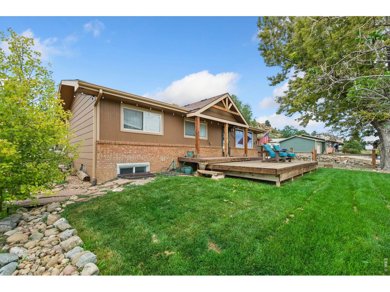Incredible opportunity to experience the peace of mountain living in very sought-after West Loveland. The perfect blend of modern comfort and Colorado's natural beauty, in this 4 Bedroom/2 Bath home. Step outside to enjoy panoramic Front Range views, frequent wildlife visitors-including elk herds, deer, turkey, and bighorn sheep-and peaceful rural living just 5 minutes from Sweet Heart Winery for award-winning wines and scenic relaxation. Spanning 2,200 sq ft of finished living space on a 0.29-acre lot, this updated ranch style home offers 4 bedrooms and 2 full baths with thoughtful upgrades from 2020-2025: paint, stainless steel gas cooktop/oven, granite countertops and custom cabinets, wood flooring, updated electric featuring recessed lighting, ceiling fans, electrical transfer switch with emergency generator hookup, expanded front deck, fencing and professional landscaping, new gas hot water heater, and a beautifully finished basement complete with a full bathroom, a 10'x12' bedroom with egress window, spacious family room, dedicated workout room, plus new carpet, trim, and lighting. Includes an oversized driveway, 2-car attached garage-delivering the ideal mix of country tranquility and everyday convenience. Your Colorado dream home awaits. Just 14 minutes from Loveland, 30 minutes from Fort Collins, and 34 minutes from Estes Park, 5 mi to Devil's Backbone Opens Space...it's ideally positioned for easy access to all amenities and Rocky Mountain adventures.NO HOA fees. No Metro.