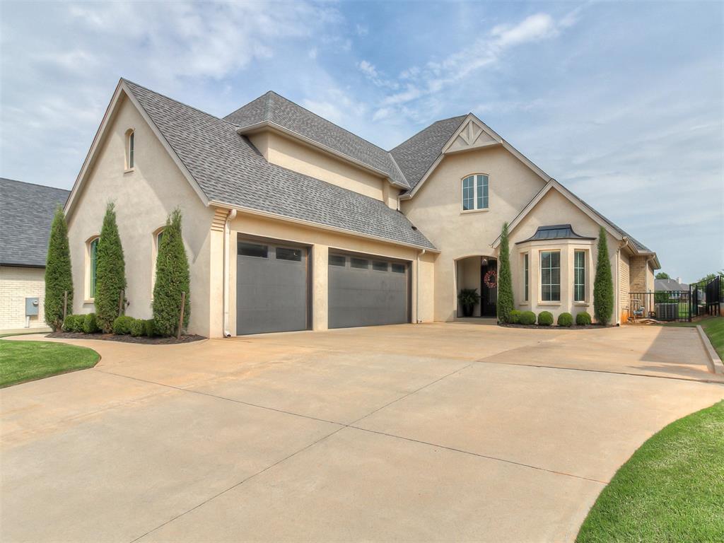Nestled within the prestigious Oak Tree Golf and Country Club community, this elegant French-style home offers timeless charm and exceptional amenities. Featuring 4 spacious bedrooms with an optional game room, this thoughtfully designed residence also includes a private study adorned with built-in bookcases.

Enjoy sweeping views of the manicured golf course from the upstairs balcony, or relax in the expansive outdoor living space complete with a built-in grill and fireplace, perfect for entertaining. Inside, the home boasts luxurious granite and marble countertops, custom cabinetry, and a functional layout ideal for modern living.

The primary suite is conveniently located on the main floor and connects directly to the laundry room for added ease. All secondary bedrooms are upstairs, providing privacy and space for family or guests. Additional highlights include a 3-car garage, an underground storm shelter for safety, and access to the neighborhood pool.

This home blends classic style with everyday comfort, all in one of Edmond’s most sought-after golf communities.