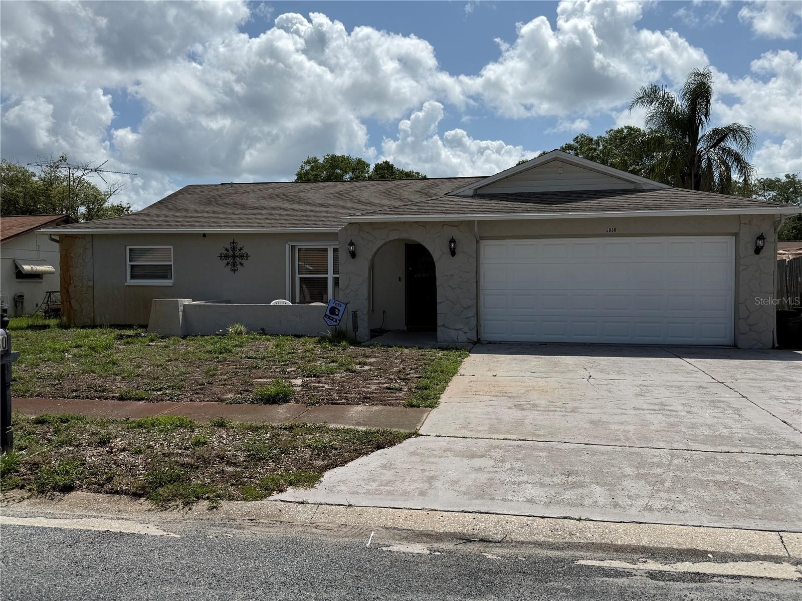 Short Sale. Hidden Gem located in the Deer Park Subdivision. Spacious floor plan to include 3 bedrooms / 2.5 bathrooms with plenty of space for everyone!  Recently remodeled kitchen to include stainless steel appliances, granite countertops, wood cabinetry, and vinyl flooring throughout the home.  Also recently remodeled bathrooms to include granite countertops, new vanities with the guest bath having dual sinks and the Primary Bath offering an extra large sink with two faucets.  The home offers an open floor plan to include a Family Room, Eat-In Kitchen area and also a breakfast bar, a Living Room and Dining Room.  The enclosed Lanai is perfect for all types of weather.  The home has been updated with Hurricane Impact Windows to secure the home with inclement weather conditions.  The oversized driveway can is a three car driveway.  Grab this Gem while it's still available!