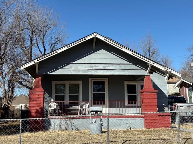 Investor special or perfect first home with serious potential! This 2-bedroom, 1-bath property sits on a large lot and features a charming front porch accented by classic brick pillars, delivering standout curb appeal. Inside offers a blank canvas ready for your updates and personal style. The detached shop/shed adds valuable flexibility for storage, hobbies, or future use. With plenty of space and endless possibilities, this is a prime opportunity to renovate, rent, or create your ideal starter home. Don’t miss this value-add opportunity!