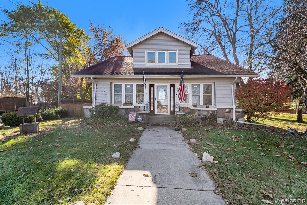 Discover a blend of comfort, character, and year-round recreation in this 5-bedroom, 2 full bath, 2 half bath waterfront home boasting 105 feet of pristine frontage on all-sports Whitmore Lake. Perfectly designed for lake living, this property offers unmatched amenities, timeless finishes, and multiple spaces crafted for comfort and entertaining. Step inside to find Italian travertine stone flooring, natural wood parquet, and beautiful marble counters throughout the custom chef’s kitchen. The open-concept culinary space features custom cabinetry, a gas stove, tile backsplash, granite counters, and stainless steel appliances, all arranged with a thoughtful, highly functional layout. A brand-new, fully custom pantry room elevates storage and organization to an entirely new level. Large windows fill the home with abundant natural light and frame stunning water views, while updated tile bathrooms, a convenient first-floor laundry, mudroom, and a charming three-season entry room add function and warmth to the home’s inviting character. The property is ideal for outdoor living with a large yard, detached 3- car garage, new perimeter fence, new water heater, and an aluminum dock—ready for your boat from day one. Electricity and water at the lakefront make outdoor entertaining and maintenance effortless. The lake-side lot is build-out capable, offering exciting potential for future expansion. Perfect for swimming, with shallow, child-friendly waters, this home also delivers four-season fun—from boating and summer recreation to ice fishing and winter sports. This is more than a home; it’s a year-round lakefront lifestyle filled with charm, modern comforts, and unforgettable views. Come experience Whitmore Lake living at its finest.