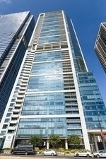 Largest one bedroom floor plan only existing on floors 5 through 14. Residences 1300 is 1337 sq ft, northeast corner home with balcony off living space.  Enjoy unobstructed southeast views of Lake Michigan. Monroe Harbor, Planetarium, and Botanical Gardens.   Unit features formal entry, En-Suite Primary Bathroom in natural stone., shower/ whirlpool soaking tub combination with Snaidero vanity, Toto and Dornbracht plumbing fixtures. Large walk -in closet with custom shelving.  Open Kitchen anchored by large kitchen island, all stainless-steel GE Monogram appliances, gas cooktop, with vented out culinary hood.  Quartiz Counters, and Snaidero kitchen cabinetry and in-unit full size stackable washer and dryer in utility room with extra storage.  Hardwood floors, floor to ceiling windows makes this condo the perfect home for entertaining.  One garage heated parking space #P3-14 available for $40K.  Additional large storage 7' tall by 6' by 5' included.