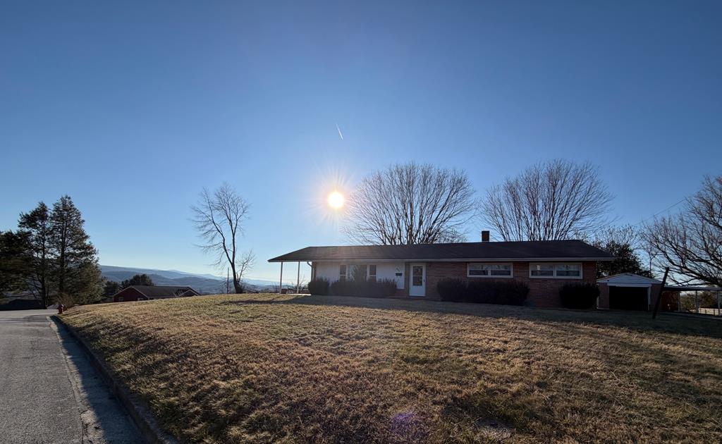 BREAKTAKING MOUNTAIN VIEWS!  Rare opportunity for Investors or someone looking to flip a brick ranch with over 1,600 sq.ft and a full unfinished basement.  3 bedrooms, 2 full baths, 2 car-carport with an oversized lot (0.62) waiting for you to remodel and make it your very own.  Close to the Marion VA Water Park, Lincoln Theatre, Smyth County Museum, and only 8 minutes from Hungry Mother State Park.  Endless possibilities!    Please send all showing requests by Navica. For a quicker response text listing agent. Please do not show this house without approval. Buyer and Buyer's Agent to confirm all information. Some details were taken from the tax records and provided by the Seller. Information subject to E & O (deemed reliable but not guaranteed). A nice friendly reminder to all agents to please make sure all doors are locked and secure.  Property sold AS-IS, WHERE-IS.  No warranties on the appliances, heat pump, or water heater.  Electricity and water will remain off.  Inspections are welcomed but Seller will not pay for any repairs.