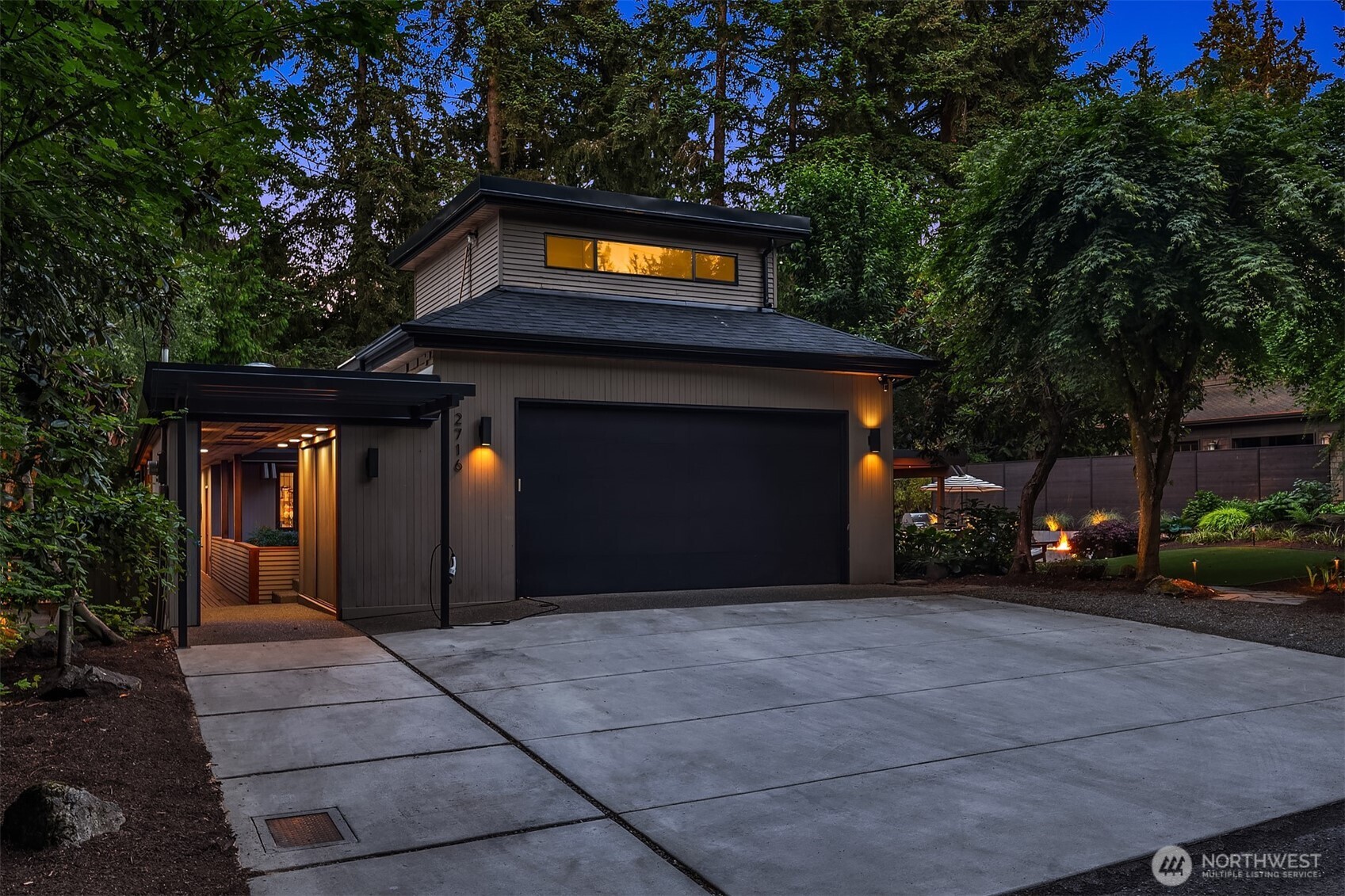 Two-car garage with covered breezeway entrance