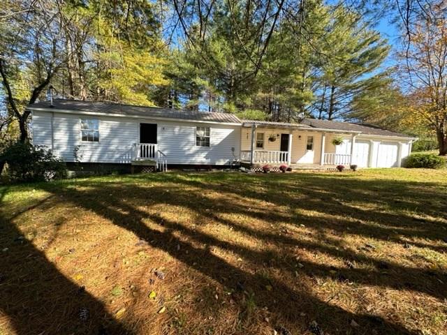 Home close to Independence. This house would make a great starter or downsize home. Tucked back in the woods on 1.75 acres, this cozy cottage has everything you need, open kitchen/living area, large laundry/mud room and attached 2 car garage. There is a covered front porch, a nice area in the back yard for outdoor living and a large basement for storage. This home is located in a quiet community a short distance to the New River, Independence, Fries and Galax.