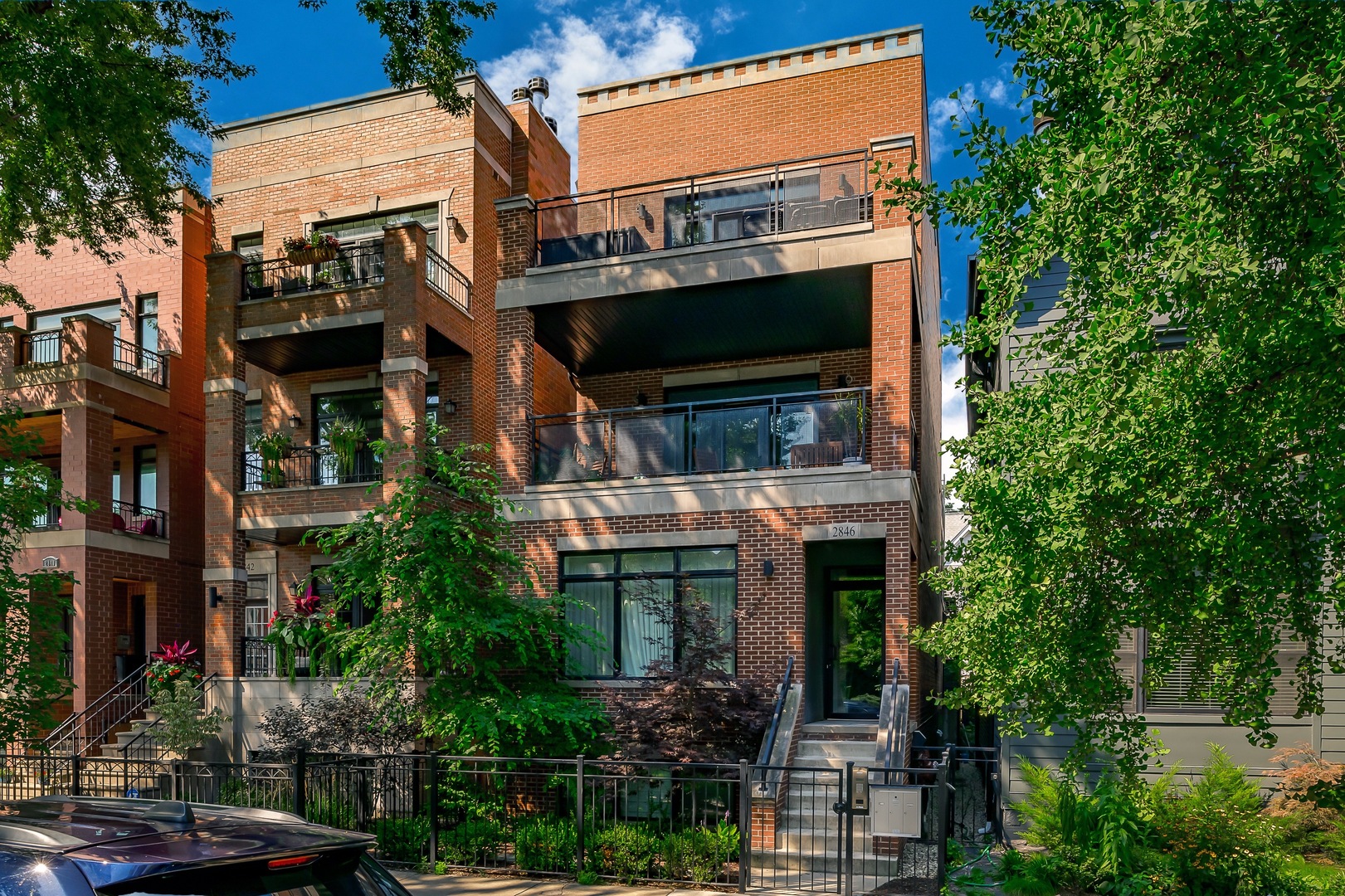 QUALITY construction designer home awaits you! This penthouse unit complete with PRIVATE ROOFDECK is ideally located on cusp of Lincoln Park and Lakeview. Luxury finishes throughout; solid brick exterior, 3.25" oak hardwood floors, high-end appliances (2020), quartz countertops, custom closets, custom millwork, surround sound capabilities, and more! Gourmet kitchen is made for entertaining with an oversized island, Wolf stove top, custom cabinetry that extends to the ceiling, and designer light fixtures.  The open floorplan, flows into the living room complete with gas fireplace, and dining room showcasing embossed designer wallpaper for an understated wow factor. Looking for outdoor space? This home features a MASSIVE Eastern exposure terrace (9'x18'!), complete with gas line for grilling, overlooking tree-lined street (great for privacy).  Make the most of the dog days of summer on your personal tiled roofdeck complete with both gas & water lines for a firepit & more - enjoy as-is, or make it the oasis of your dreams.   Primary en-suite features walk-in closet, and heated floors, dual vanity, herringbone tile work, and oversized steam shower in the bathroom. Access in hall (not bedroom) to the detached all brick garage with one parking space included in price (northernmost). There is also a personal storage closet for your overflow items in the back of the building. Nothing to do but MOVE RIGHT IN!
