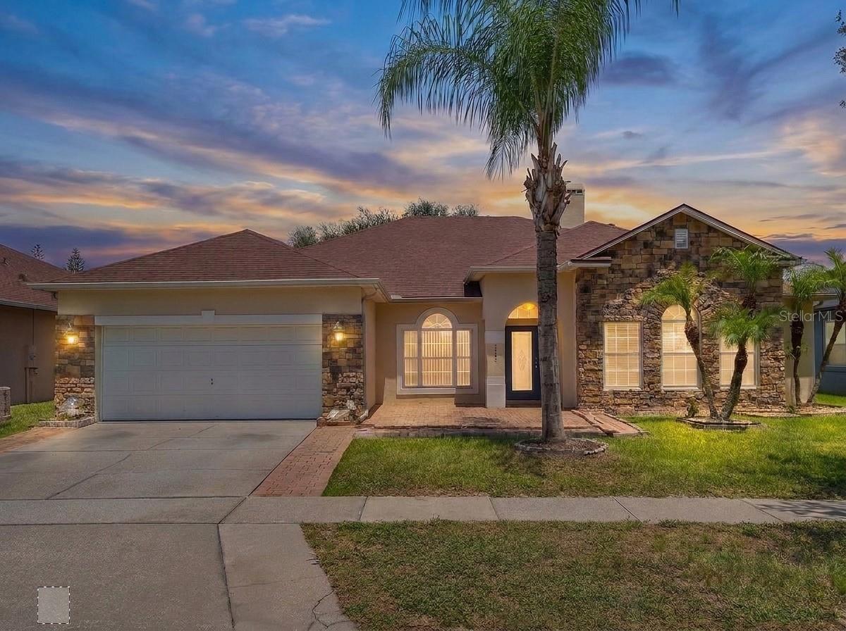 Virtually Staged. Welcome home to this beautifully maintained 4-bedroom, 3-full-bath pool home located in Orlando’s desirable Falcon Trace community. Offering a spacious and well-designed layout, this home features tile flooring throughout, an open-concept floor plan, and plenty of natural light, perfect for both everyday living and entertaining. The kitchen features granite countertops and stainless steel appliances, adding both style and functionality to the space. Unwind in the main living area, where a cozy fireplace creates the perfect gathering spot. Bonus Space: Formal Living / Office, Perfect for Work or Relaxation, offering even more flexibility for your everyday needs. Step through the rear doors to your own private backyard retreat, complete with an in-ground swimming pool enclosed by a full screened lanai, creating the ideal space to relax or host family and friends. Residents of Falcon Trace enjoy an outstanding selection of resort-style amenities, including a community pool, tennis and basketball courts, playgrounds, and scenic walking trails. Conveniently located near SR-417, Florida’s Turnpike, Osceola Parkway, John Young Parkway, and US-17/92, this home provides easy access to Orlando International Airport (MCO), Downtown Orlando, Lake Nona, shopping, dining, and world-famous attractions such as Walt Disney World and Universal Studios. Don’t miss it! Schedule your showing today.