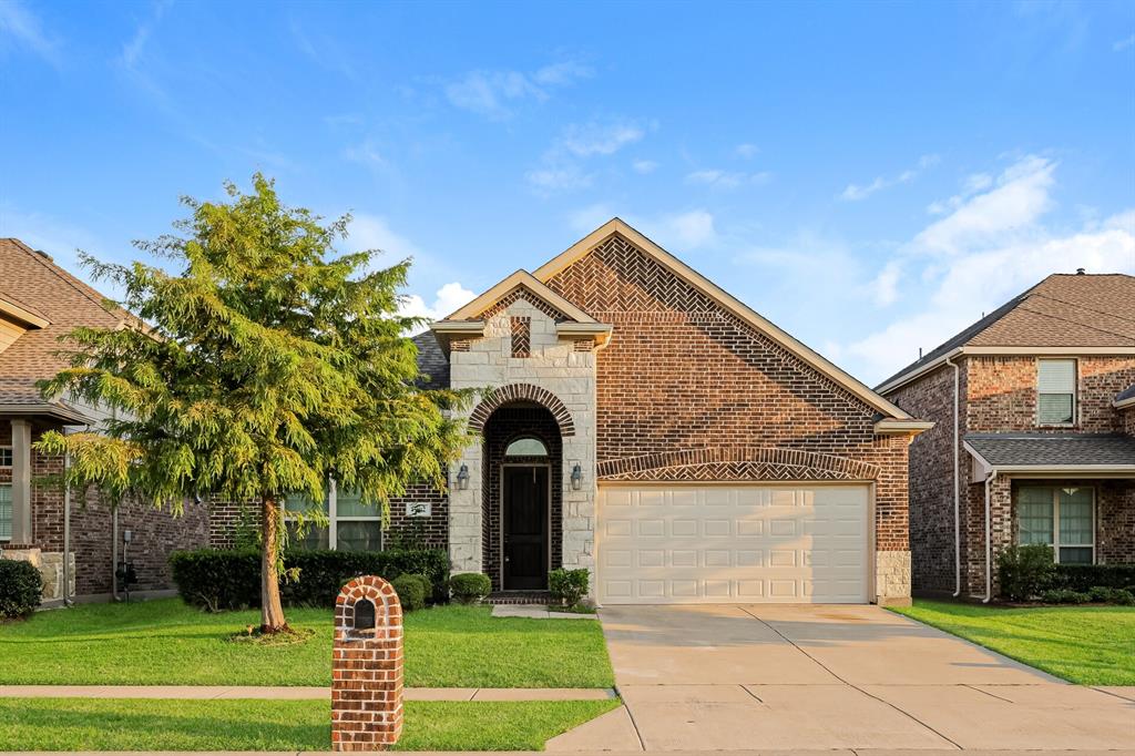 Beautiful curb appeal welcomes you to this stunning 4-bedroom, 3-bath Frisco home! Inside, an open floor plan pairs rich wood floors and elegant tray ceilings with a cozy gas fireplace, creating an inviting space for everyday living and entertaining.The kitchen shines with upgraded white cabinetry, granite countertops, stainless steel appliances, and an oversized island with a breakfast bar. Generous cabinet and counter space make meal prep and hosting a breeze.Retreat to the spacious primary suite, featuring a private bath with dual sinks, granite countertops, a garden tub, separate shower, and walk-in closet. Thoughtful finishes continue throughout the home, including neutral paint, granite countertops in every bathroom, and ceiling fans in all bedrooms.Outside, enjoy a generously sized backyard and covered patio—perfect for morning coffee or unwinding at the end of the day. Brick flooring on both the entry porch and back patio adds a distinctive finishing touch. With its inviting layout and beautiful details, this Frisco home is a must-see. Schedule your showing today!