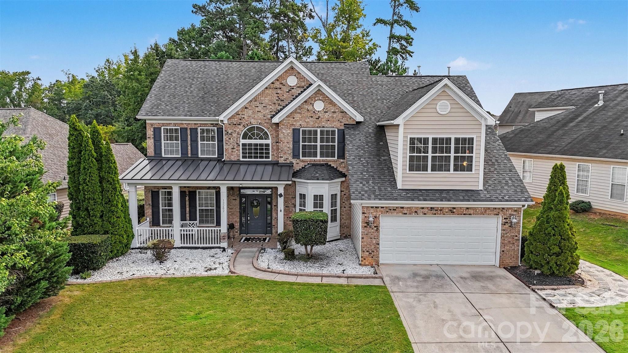 Welcome to this spacious home in Charlotte’s Stafford community, offering soaring ceilings, a dramatic two-story great room, and abundant room to spread out. A screened porch, flexible upstairs bonus and loft spaces, and a generous backyard make this home equally suited for everyday living, entertaining, and relaxing.Inside, an inviting foyer opens to spacious living and dining areas accented by architectural details and abundant natural light. The impressive great room is anchored by a floor-to-ceiling brick fireplace and flows into the kitchen and breakfast area, creating a comfortable gathering space at the heart of the home. The kitchen features warm cabinetry, a center island, pantry storage, and plenty of workspace. The main-level primary suite provides a private retreat with a spacious bedroom, walk-in closet, and en-suite bath featuring a dual-sink vanity, soaking tub, and separate shower. Upstairs, additional bedrooms are complemented by a large bonus room and loft, providing excellent flexibility for a media room, game room, home office, fitness space, or additional lounge area. Outside, enjoy a welcoming front porch, screened rear patio, and storage shed, offering multiple spaces to enjoy the outdoors. An attached two-car garage adds everyday convenience. The Stafford community offers neighborhood amenities including an outdoor pool and playground, giving residents convenient options for recreation close to home. Located in northeast Charlotte, this home also provides access to the University City area, nearby shopping, dining, parks, and major roadways for convenient travel throughout the Charlotte area.