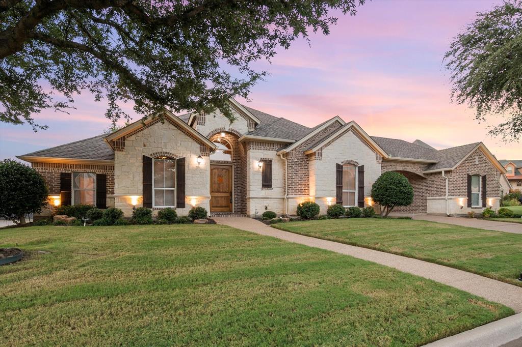 Welcome to 2005 Stone Canyon Ct - a beautifully appointed single-story home tucked away on a quiet cul-de-sac in Arlington’s highly desirable, gated Highland Ridge Addition. Set on just over a half-acre lot, property offers timeless curb appeal, a thoughtful floor plan and an incredible blend of comfort and functionality.
New roof installed in 2022 with upgraded 50-year shingles provides peace of mind for years to come. Step inside and you’re greeted by soaring ceilings, rich wood accents and abundant natural light. Home’s amazing open floor plan is ideal for both everyday living and entertaining, w multiple living areas anchored by 2 fireplaces and elegant finishes throughout.
Gourmet kitchen is the heart of the home featuring granite countertops, a large island, slate backsplash, stainless steel appliances and gorgeous cabinetry. Adjoining breakfast nook and family room w a wall of windows overlook the expansive backyard creating a bright, inviting atmosphere. Formal dining and living rooms provide additional space for hosting and holidays while a private study w French doors is perfect for a home office.
The luxurious primary suite is a true retreat, offering a spacious sitting area, built-in desk and a spa-inspired bathroom w dual vanities, a soaking tub, walk-in shower and oversized walk-in closet. Three additional bedrooms are generously sized w one bedroom split for privacy. Two of the secondary bedrooms share a convenient Jack-and-Jill style bath.
Step outside to enjoy a covered patio and a sprawling backyard w mature trees, lush landscaping and covered porch. The property also includes an attached 2-car garage and detached 1-car garage with porte-cochère, storage shed and full sprinkler system.
Located just minutes from Arlington’s shopping, dining and entertainment; this rare half-acre property offers the perfect combination of space, upgrades and convenience. Don’t miss your opportunity to make it yours - schedule a private showing today.