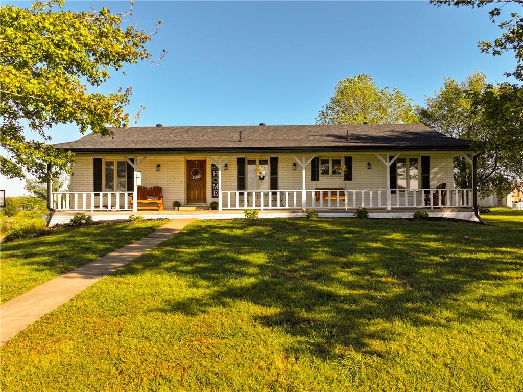 Home For Sale Cedar County MOLooking for peace, privacy, and beautiful country views? This spacious home sits on 3 acres along a paved road, surrounded by neighboring farms and overlooking cattle country and the nearby nature preserve prairie. From quiet mornings on the porch to colorful sunsets across the countryside, this property offers the relaxing rural lifestyle you’ve been searching for while still keeping you close to town.The home features 4 bedrooms, including 1 nonconforming bedroom, and 3.5 bathrooms with plenty of space for family and guests. Inside, the open-concept floor plan creates a comfortable place to gather and entertain. The kitchen features granite countertops and a GE appliance package approximately two years old. New luxury vinyl flooring throughout the upstairs and basement gives the home a fresh, updated feel. Jack-and-Jill bathrooms add convenience upstairs, while a newly finished room downstairs is ideal for a home office, playroom, hobby room, or additional living space.Outside, enjoy attractive landscaping with young hydrangeas and plenty of open space for a garden, chickens, pets, or your own small homestead. The two-car garage offers convenient parking, while the 40x50 detached shop, with approximately half concrete flooring, provides excellent space for equipment, projects, recreational gear, or additional storage.Home For Sale El Dorado Springs MOLocated near El Dorado Springs, this property combines the quiet of country living with convenient access to shopping, dining, schools, and everyday necessities. Rural water and paved-road frontage add even more convenience.For those who love the outdoors, the property is within driving distance of both Stockton Lake and Truman Lake, opening the door to fishing, boating, camping, and countless weekend adventures. Come home at the end of the day, sit back, and enjoy peaceful prairie views and beautiful Missouri sunsets.