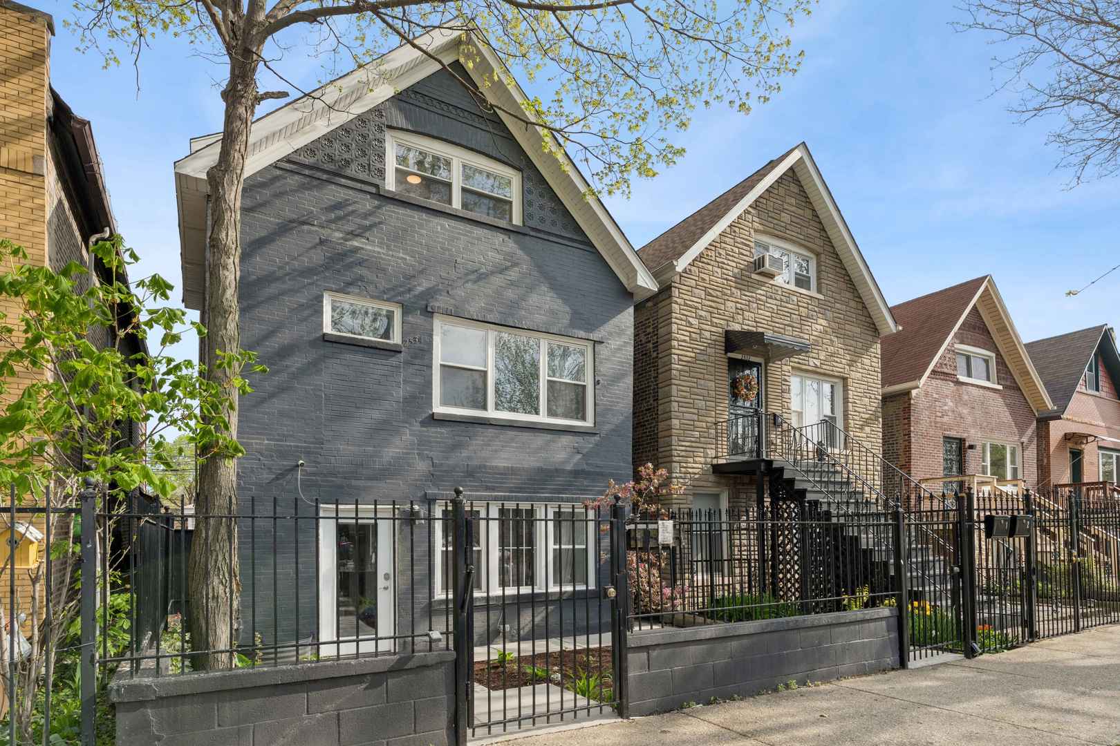 Stunning and rarely available recently FULLY RENOVATED SFH with soaring ceilings situated in the heart of HOT Ukrainian Village on a most coveted tree-lined street! This exceptional 5 bed / 3.5 bath single-family home with a 2-car garage showcases modern luxury, featuring hardwood floors throughout, high vaulted ceilings, an abundance of natural light, and an expansive open-concept living/family/dining/kitchen floor plan that seamlessly leads to a PRIVATE BACKYARD that's tailor-made for entertaining or unwinding in style. The chef's kitchen features modern cabinetry, quartz countertops, a beautiful backsplash, and premium stainless-steel appliances. Upstairs, the OVERSIZED sun-drenched primary suite boasts tons of natural light, a large custom walk-in closet, and a spa-like ensuite bathroom complete with dual vanities, a luxurious steam shower and separate soaking tub, and upscale finishes. Another generously sized bedroom and a full bath complete the second floor. The top-level features THREE ADDITIONAL bedrooms with a full bathroom. The private backyard and detached 2 car garage complete this incredible home. Perfect location on a beautiful tree lined street while still being just steps away from Division and Ukrainian Village's vibrant dining, shopping, parks, entertainment and public transportation. Don't miss this one-of-a-kind home in one of Chicago's most sought-after neighborhoods!