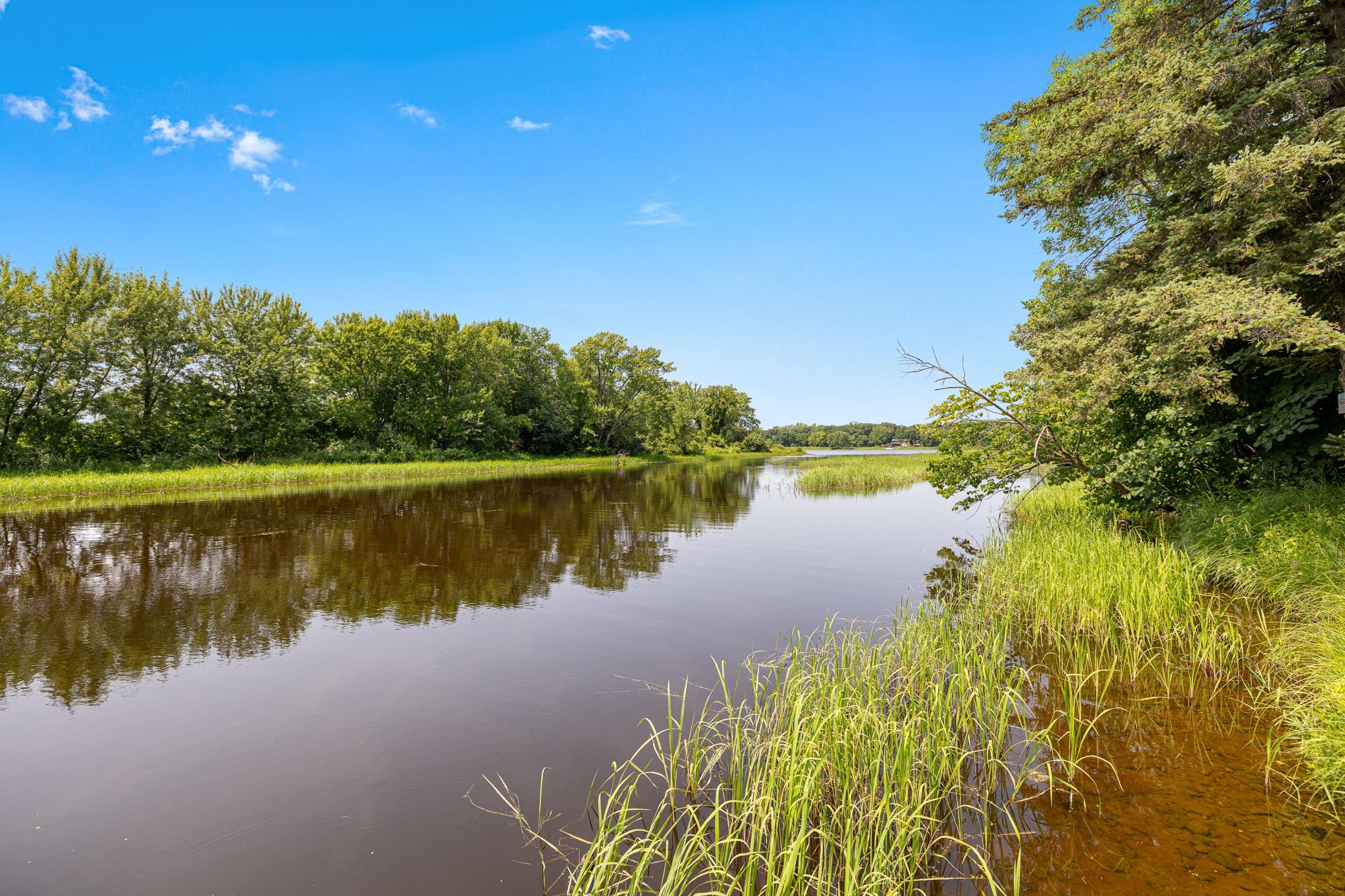 Calling all contractors, investors, and visionaries! This well-built Mississippi River property offers an incredible opportunity to restore and customize a truly special home. Situated on 7 scenic acres with 630ft of private river frontage, the property features two walking paths leading directly to the water, creating the perfect setting for fishing, kayaking, or simply enjoying the peaceful surroundings.The spacious home offers over 5,237 finished square feet with 5 bedrooms and 4 bathrooms, including 4 bedrooms conveniently located on one level. Quality craftsmanship is evident throughout with beautiful natural woodwork and a solid construction that's ready for its next chapter. A 3-stall garage provides ample space for vehicles, tools, and recreational equipment.With exceptional bones, an unbeatable riverfront setting, and endless potential, this is a rare opportunity to create your dream estate on the Mississippi River. Bring your vision and transform this property into something truly extraordinary.