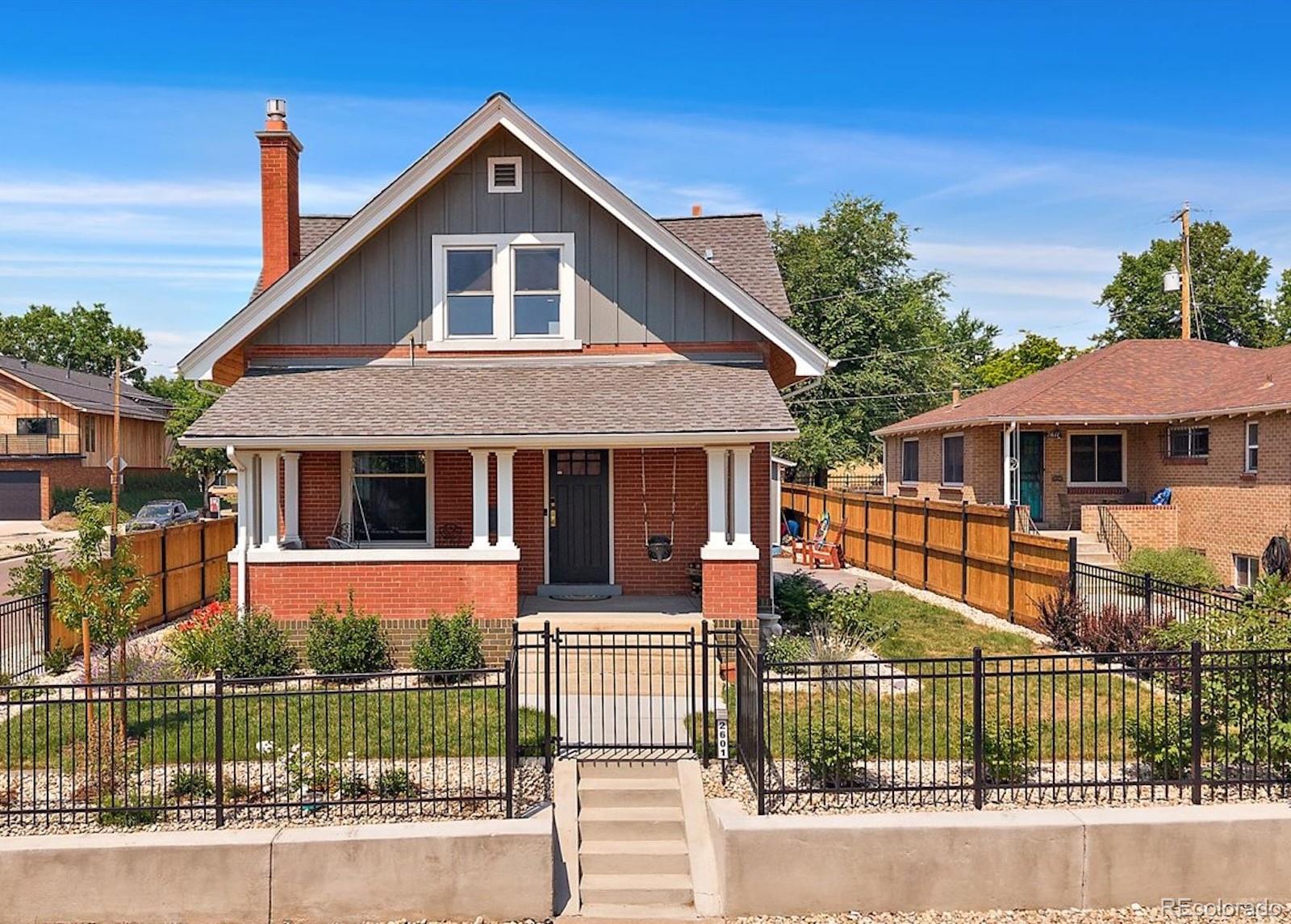 Turn-of-the-Century Victorian Elegantly Restored One Block from Sloan’s Lake. Two Story Red Brick with Finished Basement Offering 5 Bedrooms, 4 Baths, Office and Nearly 3,500 Finished Sq Ft. Thoughtfully Curated with Modern Amenities While Preserving Character. Vintage Details in Exposed Brick, Wide Plank Hardwoods, Tall Ceilings, Wainscoting, Clawfoot Tub, Solid Doors, Traditional Millwork for Baseboards and Trim. Open Concept Seamlessly Integrates Living, Dining and Kitchen Spaces with Smart Recessed Lighting. Kitchen Features Voluminous High End Cabinetry, Waterfall Countertop, Gas Range, Farmhouse Sink, Full Height Backsplash, Vast Island, Integrated French Door Refrigerator and Dishwasher. Built-In Buffet with Beverage Cooler and Bay Window in Dining Room. Gas Fireplace in Living Room Plus Mountain and Lake Views. Foyer Entry, Bedroom, Full Bath and Mud Room Complete the Main Level. Desired Second Story Layout Extends Three Bedrooms, Including Primary Retreat, Two Baths and Laundry. Primary Suite Boasts a Vaulted Ceiling, Two Walk-In Closets and Private En Suite. Five Piece Primary Bath has Roomy Circular Soaking Tub, Walk-In Shower with Sleek Tile, Double Shower Heads, Bench Seating and Frameless Glass Enclosure. Basement can be Locked Off from Upstairs, Providing Versatility for Long or Short Term Renters, Au Pair or In Laws. Two Bedrooms (One NonConf), Laundry, LVP Flooring and Almost 1,000 Finished Sq Ft. Wall of Exposed Brick in Family Room and Full Sized Kitchen with Dining Area. Outdoor Spaces Include Covered Front Porch with Beadboard Ceiling, Stamped Concrete Patio, Multiple Lawn Areas and Wrought Iron Fenced Front Yard. Extra Wide Two Car Drywalled Garage with Attic Storage. Terrific Walkability to Sloan‘s Lake, Edgewater and Tennyson Street with Direct Access to the Mountains and Downtown. Avoid the Stress, Hassle and Construction Costs of an Addition or Basement Dig Out. Considerably More Affordable Option than New Construction with Similar Specs.