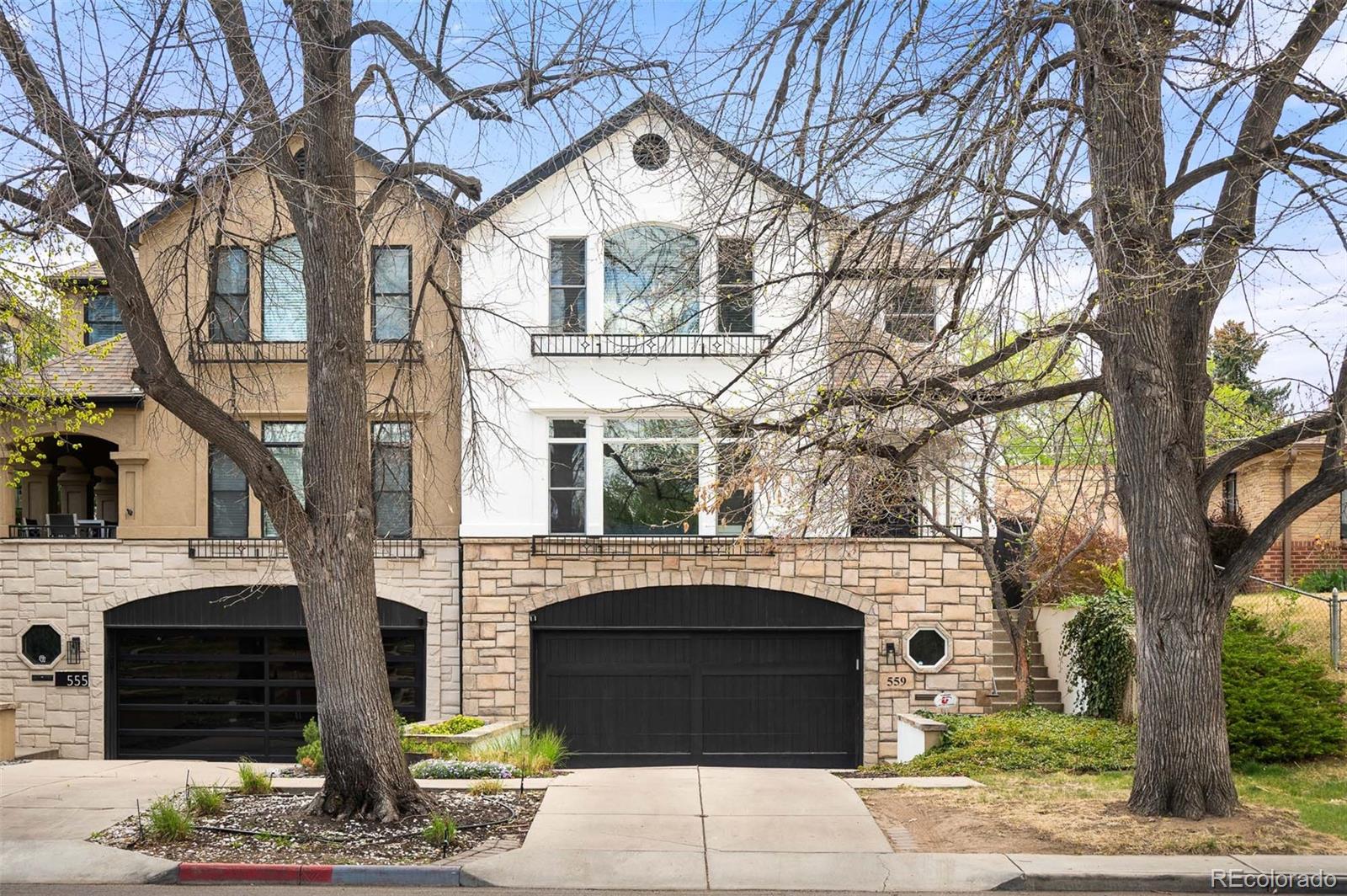 Blending modern style with warm finishes, this beautifully remodeled 4 bedroom / 4 bath Cherry Creek North townhome lives and feels like single-family home.  Thoughtfully designed for today's lifestyle, the open floor plan features soaring 10-foot ceilings, expansive windows, and abundant natural light throughout. A welcoming entry leads to a spacious living room with custom millwork, fireplace, and French doors opening to a covered front patio.  The chef’s kitchen is a stand out, complete with an oversized island, quartz countertops, premium appliances including a 6-burner gas range, double oven, walk-in pantry, and a built-in banquette dining area designed for both everyday living and gatherings.  The adjacent family room offers a second fireplace and seamless access to a private courtyard-style patio, perfect for indoor / outdoor entertaining.  Upstairs, retreat to the light filled primary with a spa-like bath, gas fireplace, generous walk-in closet, and large, private balcony. Two additional bedrooms with walk-in closets share a newly updated full bath.  The finished basement adds flexible living space with a bedroom, full bath, and ample storage—perfect for guests, recreation, or a home gym.  Ideally located just moments from Cherry Creek North’s premier dining, shopping, and amenities, this home delivers a refined, low-maintenance lifestyle in one of Denver’s most desirable neighborhoods.