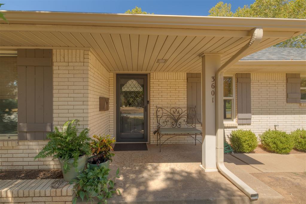 Welcome to Edgewater, located near Lake Hefner, it offers easy access to highways, outdoor recreation, and is minutes from all the modern conveniences that make life easier. This beautifully updated 3 bed 2.5 bath ranch home blends timeless 1960s charm with thoughtful modern improvements. Located on a picturesque corner lot, the property is framed by a distinctive ornamental brick fence and mature landscaping that make the backyard feel open yet private.  Inside, warm wood flooring welcomes you and is found throughout the main living spaces, while the updated kitchen features quartz countertops, stainless steel appliances, filtered water at the sink, and abundant storage. Multiple living and dining areas offer flexibility for everyday living and entertaining. Recent improvements include a brand-new roof and gutters, updated windows, can lighting, and door hardware that will make you rethink your next Home Depot purchase. This home is perfectly sized inside, and the oversized two-car garage provides additional storage, built-in shelving, and a workbench for hobbies or projects. Outside, a covered patio is easily accessible with multiple access points creates an inviting space to relax, entertain, or enjoy the backyard year-round.Combining classic ranch-style architecture, quality updates, and a prime NW OKC location, this Edgewater home offers a rare opportunity to enjoy the best of both character and comfort.  Come take a peek, it won't be a waste of time.