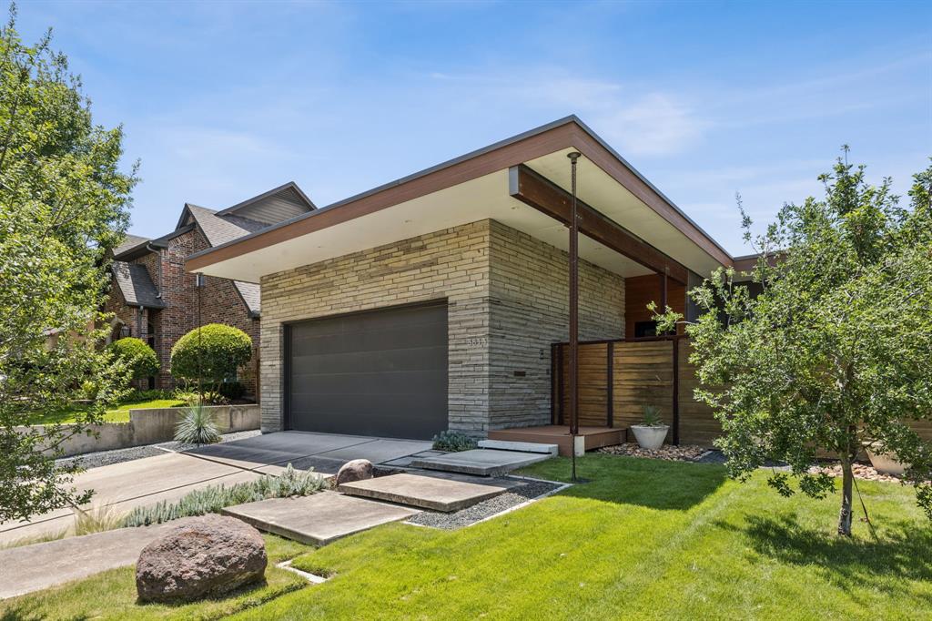 Contemporary Modern designed by Norman D. Ward and featured in the 2015 AIA Tour of Homes. Nestled in Fort Worth’s highly desired Monticello neighborhood, this single-story home offers a thoughtfully designed living space. After the security gate at the private entry bridge and the custom steel front door, you will find polished cement floors, white walls, grey natural stone and blond ebony accent walls throughout the home. Inside, you will enjoy the open living area with high ceilings and abundant natural light.  Full-length corner windows expand the view to the private courtyards. The kitchen has a crafted Italian Varenna Poliform cabinetry, contemporary fixtures, custom steel vent, professional Miele appliances, natural stone accents, and sleek lines. In keeping with the home's simplicity, a commitment to natural design elements was used throughout, including steel, blonde ebony, Danta, Kane and Okoru hardwoods.  Notice the custom repeating motif in driveway, front door and interior doors. A see-through gas fireplace connects the dining room and studio. The beautiful primary suite features a California Closet custom system, dual sinks, a soaking tub and open shower. Solar panels, tankless HWH, elevated insulation, EV charger and sustainable landscaping contribute to energy efficiency. Privacy, function and comfort come together in this custom home surrounded by mature landscaping, including a Full Moon maple accenting the home in one of the light wells. A tall fence wraps the property, offering seclusion. Security, lighting, HVAC and intercom can all be controlled through the Control4 smart home technology. The sprinkler system can be monitored remotely, contributing to a truly lock and leave home. Natural design elements brings warmth and livability to this sleek modern home. Minutes away from River Crest Country Club, museums and the Cultural District offering walkability to charming neighborhood establishments in the heart of Fort Worth.