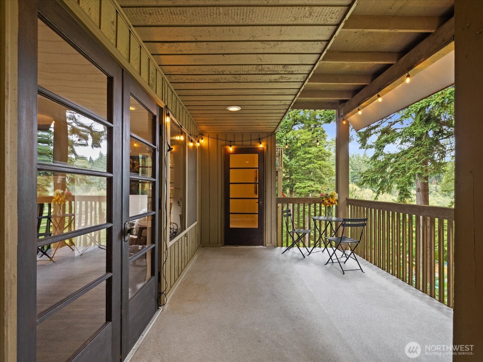Welcome Home to Parkview Firs nestled in the forest with rare privacy, a pool, clubhouse, pickleball, tennis & basketball courts, outdoor firepit with benches, pond & trails. You'll love this gorgeous, incredibly spacious 2 Bedroom & 2 Bathroom Condo with a huge almost 500sqft covered Patio overlooking the greenspace. Imagine soaking in the view & serenity while enjoying coffee, breakfast or an evening drink with friends. This flowing Open floorplan includes a wide Living Room with fireplace, wall of view windows & French doors leading out to the Patio, separate Dining Room also with view windows, bright open Kitchen with sitting Bar & open area for second table or work space. Primary Bedroom Suite is very large with view windows, door out to the covered Patio & lovely Primary Bathroom Suite with dual vanities & large Walk-in Closet. 2nd Bedroom has wall of closets & view to the front - great home Office or Den. Lots of Storage inside the Condo AND additional Storage for the Unit in the Basement. 2 dedicated Parking spaces, 1 covered Carport Parking space & 2nd Parking space #205 in the lot, as well as Visitor spots always available. Welcome Home to this rare setting & lovely unit!