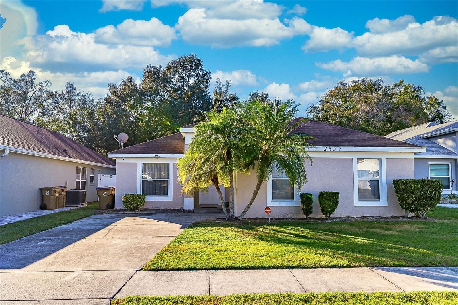 Rare 2/2 pool home in Kissimmee.  Fenced in yard with screened pool and tree buffer behind the property behind for privacy.  Home has some updates in bathrooms.  Ceramic tile throughout with newer carpeting in both bedrooms.  Indoor laundry and one car garage.  Located just off Rt 192, 5 miles to Disney property.