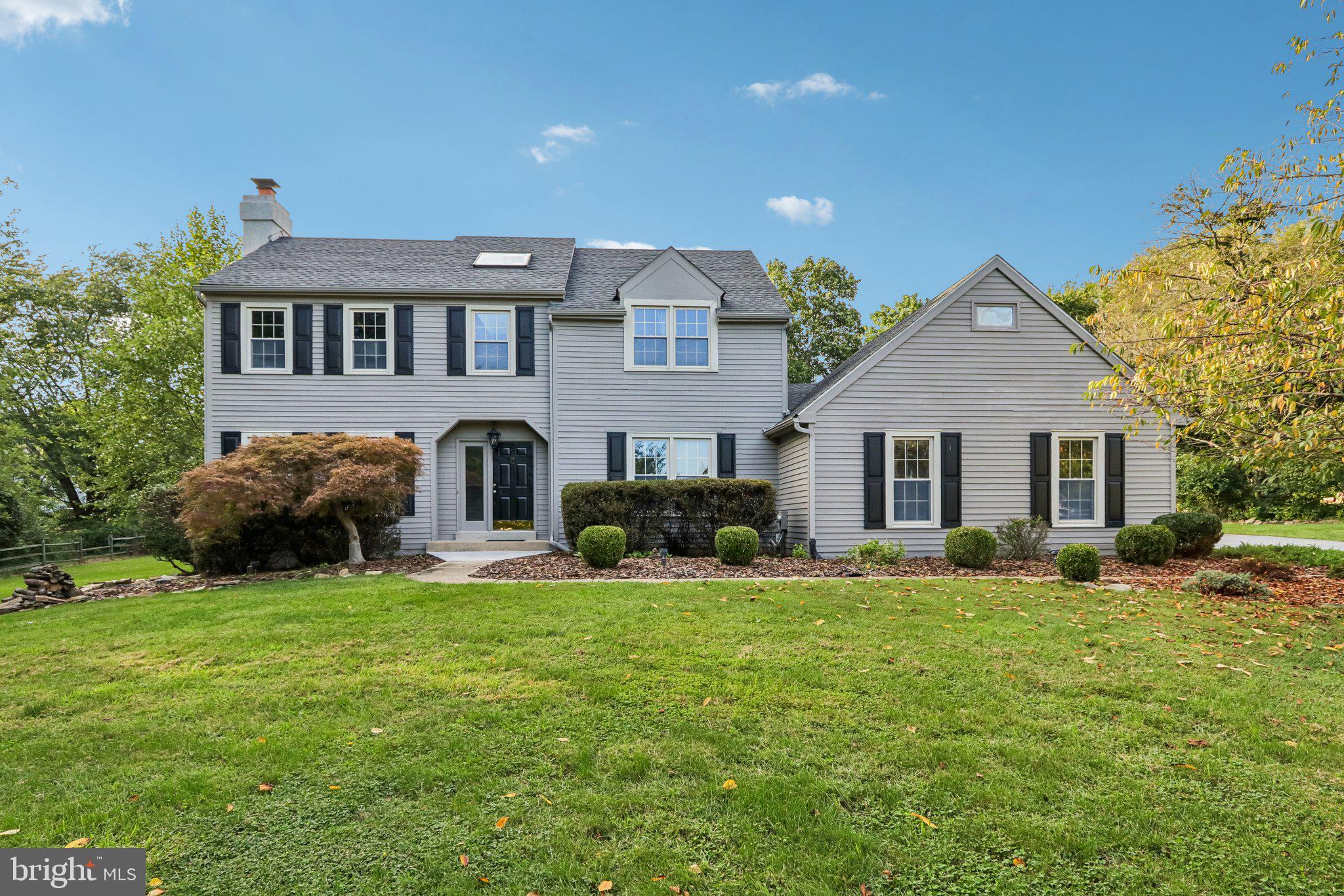 Welcome to this beautifully maintained, spacious, and sun-filled single-family home in the sought-after Bridlewood neighborhood! From the moment you enter, you’ll be impressed by the soaring two-story foyer, flanked by elegant formal living and dining rooms. The expansive living room is filled with natural light from an abundance of windows and features gleaming hardwood floors and a charming wood-burning fireplace. A door leads directly to the newly refinished rear deck, creating an ideal flow for entertaining and outdoor enjoyment. The living room opens to the bright breakfast nook, which is part of the eat-in kitchen and features a beautiful bay window overlooking the deck and backyard. The kitchen is well-appointed with granite countertops, stainless steel appliances, and a convenient pantry. The formal dining room is conveniently accessed from the kitchen. A powder room, laundry room, and access to the two-car garage complete the main level. The laundry room which is equipped with an EV charger provides convenient access to the driveway. Upstairs, the spacious primary suite offers a peaceful retreat with a walk-in closet and an ensuite bathroom featuring a separate vanity area and walk-in shower. Two generously sized secondary bedrooms, each offering ample natural light, share a full hall bathroom. The fully finished basement provides even more living space, featuring a large recreation room with a distinctive exposed brick wall and a versatile bonus room that would make an excellent home office, gym, playroom, or even a potential fourth bedroom. Enjoy the outdoors on the newly refinished rear deck overlooking the private, flat backyard. The expansive outdoor space offers a ground-level patio perfect for a fire pit, a swing set, and a storage shed. Major updates include a brand new HVAC system installed in June 2026, newly refinished rear deck in 2026, new hardwood floors in 2017, resurfaced chimney in 2022, and a fully painted exterior in 2025. Located in the highly desired Downingtown Area School District, Bridlewood offers a peaceful and welcoming neighborhood setting while providing convenient access to shopping, restaurants, parks, and recreation, including nearby Marsh Creek State Park. Easy access to major highways makes commuting and exploring the surrounding area a breeze. This wonderful home combines generous living space, thoughtful updates, abundant natural light, and exceptional indoor-outdoor living in a desirable location. Don't miss the opportunity to make it your own! Mortgage savings may be available for buyers of this listing.