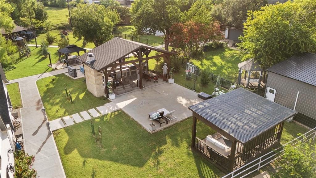 Welcome to Your Private Oasis in Rowlett!Discover this stunning 3,874 sq. ft. luxury home nestled on a serene 2.48-acre private estate, just half a mile from George Bush Turnpike and Firewheel Town Center. This property is truly one-of-a-kind, offering a perfect blend of elegance, comfort, and resort-style living.The main residence boasts 4 spacious bedrooms, elegant fixtures, and designer upgrades throughout—including quartz countertops, porcelain backsplash, and sparkling crystal chandeliers. With a new roof and new AC units, peace of mind comes standard.Step outside and experience an entertainer’s dream! The property features:ADU's are all fully furnished with brand new furnitures and it all can come with acceptable offer.Two  barn-style another ADU's with camping area.A charming cabin retreatPicturesque vineyard & pondMetal garage,workshop and lots of parking area for boats , RV and multiple vehicles.Pavilion & outdoor spaWhether you’re seeking  a private retreat, this estate offers unmatched versatility and value. Your dream of hosting unforgettable gatherings, creating a family compound, this property delivers.Location, luxury, and lifestyle—this property has it all. Don’t miss your chance to own a rare gem in Rowlett!POOL permit is ready and could be done in 3 weeks time if buyer decides to add it.Seller offering up to $50,000 in buyer incentives with acceptable offer. Terms and conditions apply.