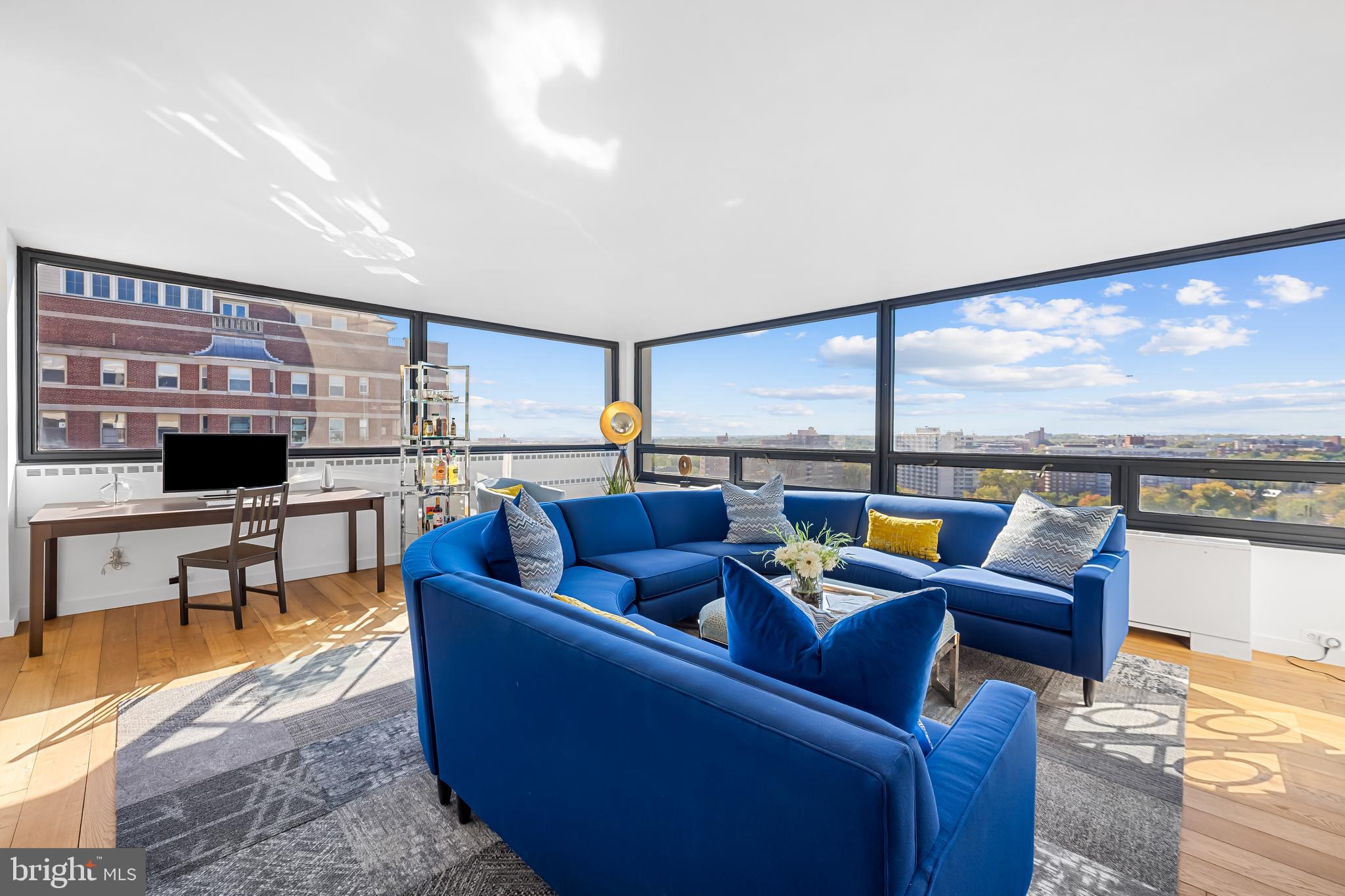 High above the beautiful and historic Guilford neighborhood, this rarely available sleek and contemporary corner unit captures panoramic skyline views of Baltimore City and beyond. The architecturally important and timeless structure is located on a relaxed stretch of the renowned Charles Street Corridor offering convenient city living close to upscale dining, shopping, bustling sidewalks, museums, parks and Loyola, Notre Dame of MD, and Johns Hopkins university campuses. Enter the grand two-story lobby and ascend to a sophisticated light-filled residence with remarkably long views from nearly every room. Features include deluxe PanTim French oak flooring throughout, a handsome kitchen with gas cooking, honed soapstone counters and stainless appliances, a primary bedroom with large walk-in closet and ensuite bath, plus second bedroom and adjacent bath with walk-in shower. Recently installed window film to reduce heat and glare assures enjoyment of the astounding views on the brightest of days. A multitude of amenities include 24/7 front desk attendant, front door valet for optional garage parking, lower-level laundry facilities, extra storage spaces, spacious residents’ lounge with fireplace, fitness room, and seasonal outdoor swimming pool. Condominium fees include water, sewer, gas, heating, and air conditioning. Enjoy city living in this beautifully appointed move-in ready residence. Furnishings available for purchase.
