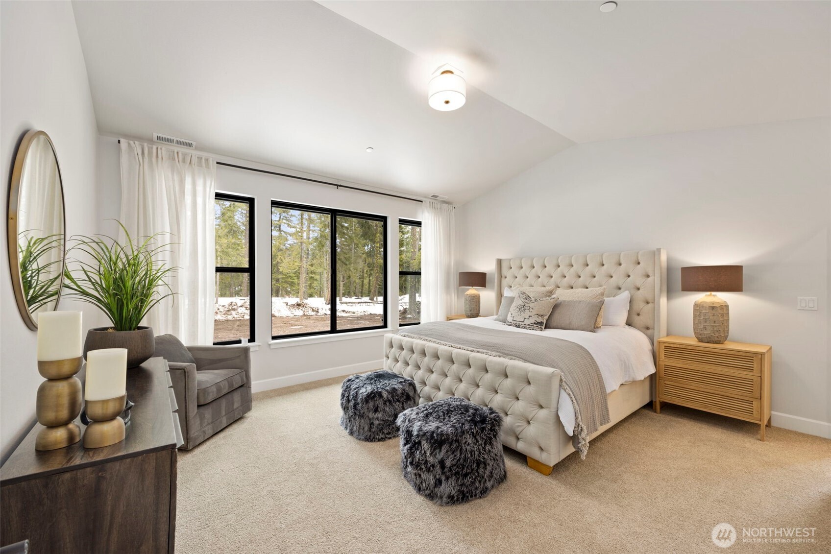 An incredibly spacious primary suite offers a peaceful private retreat to create your own mountain oasis.