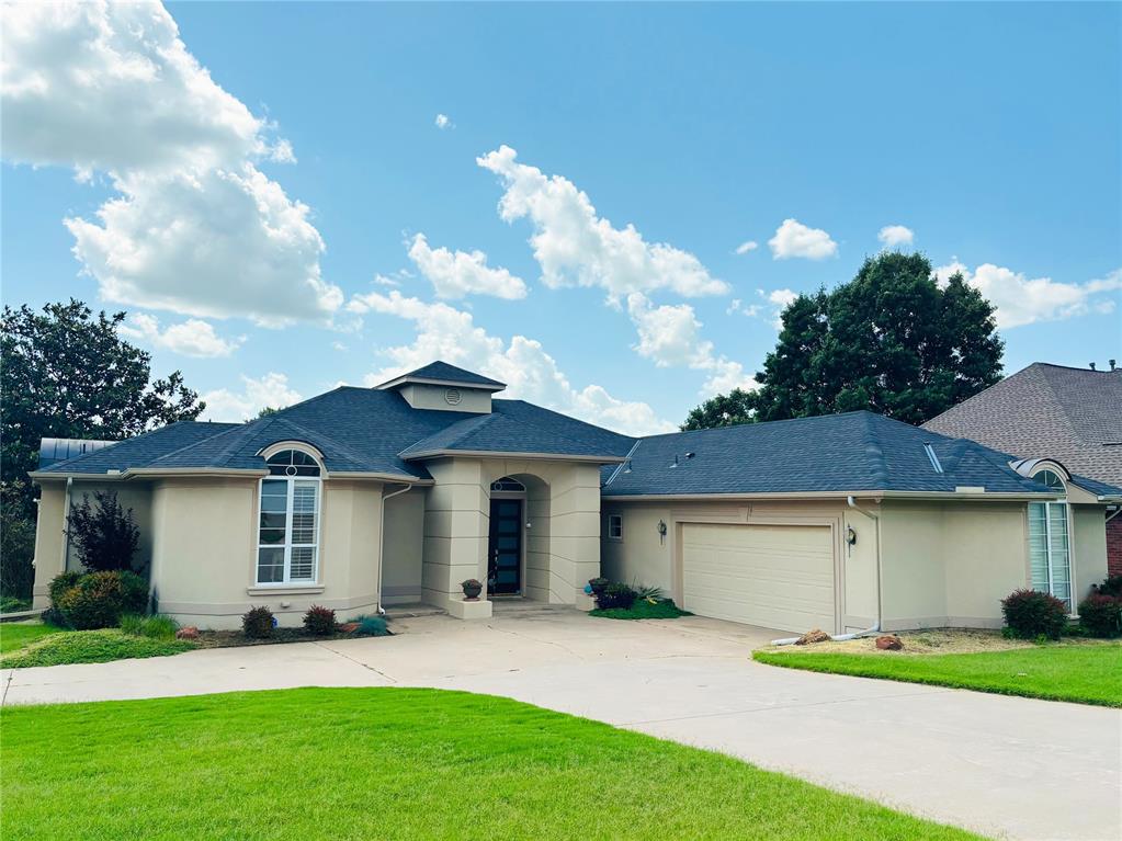 Welcome to this beautifully designed home located just west of Norman, offering the perfect blend of comfort, style and function. Set on a large corner lot with an in-and-out driveway, with 3-bedrooms and 3-full bathrooms, this property is thoughtfully designed with high ceilings and packed with desirable features.
Inside, you will find a spacious layout that includes a formal living room, a cozy family room with a fireplace, and a bright dining area-all filled with natural light from large windows equipped with built-in blinds for added convenience and privacy.
The stunning kitchen features granite countertops, a large island bar ideal for gatherings, and built-in wine storage-perfect for both everyday living and entertaining.
The luxurious owner's suite is a private oasis with its own gas fireplace, direct access to the backyard pool, a spa-like en-suite bathroom, and an oversized walk-in closet.
Step outside to enjoy your own backyard retreat, complete with a sparkling swimming pools, an outdoor area for family gatherings and well-maintained landscaping equipped with a built-in sprinkler system.
For peace of mind, the home also includes a storm shelter and a security alarm system.
This home truly has it all-space, safety and style-all in a prime location just minutes from shopping, dining and schools. The roof was replaced in 2021, and the siding was freshly painted the same year. 
A home like this is a rare find-see it before it's gone!
