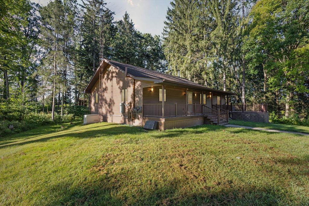 EXCEPTIONAL RURAL RETREAT: OVER 30 WOODED ACRES WITH HOME, POND, AND PRIME LOCATION. Welcome to your own private sanctuary nestled on more than 37 acres of pristine, wooded land--an extraordinary opportunity for those seeking seclusion, natural beauty, and modern comfort. This exceptional rural property isn't just a house; it's a lifestyle, offering an escape from the ordinary while keeping you within easy reach of all the necessities. Whether you're a nature enthusiast, a hunting aficionado, or simply yearning for peace among the trees, this property promises a unique blend of adventure and relaxation.-THE APPROACH: A DRIVEWAY WOVEN INTO THE LANDSCAPE.From the moment you arrive at the entrance, you'll be struck by the sense of privacy and tranquility that envelops the estate. A winding driveway meanders gracefully through mature hardwoods and evergreens, setting the stage for the serene experience that awaits. Each curve of the drive reveals new vistas---(more)(more)---shafts of sunlight streaming through the forest canopy, glimpses of deer browsing among the undergrowth, and the gentle hush that only deep woods can provide. The driveway, thoughtfully designed, ensures your home remains tucked away from the world, offering a sense of arrival every time you return.
-THE RESIDENCE: COMFORT MEETS COUNTRY CHARM.
At the heart of the property lies a well-appointed three-bedroom, two-bathroom home, designed to maximize comfort while embracing the natural landscape. Large windows frame picturesque views of the surrounding woods, flooding the interiors with natural light and bringing the outdoors in. Step into the open-concept living space, where a spacious living room flows seamlessly into the dining area and kitchen. Contemporary updates blend effortlessly with rustic detailsgleaming hardwood floors, neutral colors, and quality finishes throughout.
The kitchen is both functional and inviting, with ample cabinetry, appliances, and a central eating area perfect for gatherings. The adjacent dining area offers plenty of