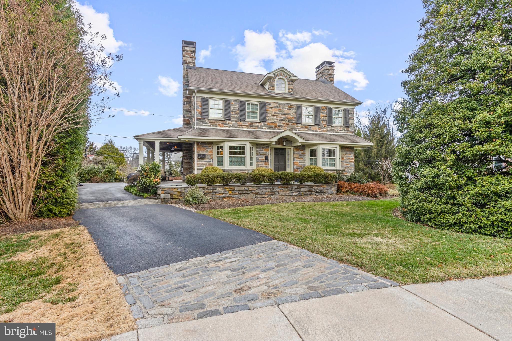 Welcome to 8 Cedarbrook Road - a beautifully-crafted 4 BD, 3/1 BA colonial  home that blends timeless character with thoughtful renovations in the exceptional Merion Golf Manor neighborhood of Ardmore.Constructed of solid stone and brick, this gracious home features a classic floor plan and gleaming wood floors. Rooms are flooded with natural light from true divided-light replacement windows. Walls were removed to open the Kitchen to the adjacent Dining Room, creating an inviting Den that is ideal for everyday casual living. The expansive Living Room has a gas fireplace and flows seamlessly to the Dining Area, making it ideal for hosting friends and family.The Kitchen was enlarged and features stainless appliances, including a SubZero frig, Bosch dishwasher, Dacor gas range, solid wood cabinets, and a large center island with breakfast bar seating. A separate butler’s pantry provides additional serving space for entertaining —while glass-front cabinets and a walk-in pantry closet offer even more storage.Upstairs, the home was expanded to create a spacious Primary Bedroom Suite featuring a large walk-in closet and a luxurious Primary Bath with a soaking tub, separate glass-enclosed shower, and a privacy nook for the toilet. Bedroom 2 offers an en suite full Bath, while Bedrooms 3 and 4 share a Hall Bath with a tub/shower combination. The Laundry Room is on the 2nd floor, as well as a walk-in cedar closet and linen closet. Custom window shades and closet organizers further enhance this home.The finished lower level Rec Room provides ample space for a TV area plus flexible space for toys, exercise, hobbies or a game table.Outside, the craftsmanship continues with exceptional stonework, including a beautiful flagstone path and patio — both heated for easy winter maintenance. The covered side porch, complete with a fireplace, creates a cozy and inviting space for outdoor relaxation and entertaining throughout the seasons. The scenic property features specimen plantings and has been meticulously cared for. Additional highlights include a repaved driveway with elegant Belgian block accents and a true two-car garage with indoor access.Merion Golf Manor offers quiet, walkable streets and a wonderful sense of community. The Merwood Park playground and the scenic walking trails at Haverford College are nearby. Enjoy additional recreation at Haverford Reserve, with its dog park, playing fields, and community center. This exceptional Ardmore location is just minutes from shopping, restaurants, train stations, the Haverford YMCA, Suburban Square, and area golf courses, with easy access to Center City and the Airport.Showings start Thursday, March 19th. Schedule your visit today!