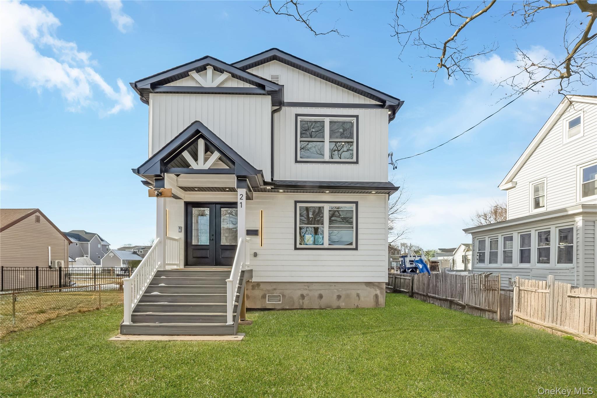 WELCOME HOME TO 21 NORMAN AVE AMITYVILLE LONG ISLAND THIS IS YOUR WATERFRONT OASIS! THIS MAGNIFICENT BRAND NEW GROUND UP CONSTRUCTION HOME CONSISTS OF 4 LARGE BEDROOMS 2.5 BATHS. AS YOU ENTER INTO THIS AMAZING CUSTOM BUILT HOME, YOU WILL SEE A LARGE OPEN CONCEPT FLOOR PLAN,  WITH LOTS OF LARGE WINDOWS, ALOWING IN FOR A AMPLE AMOUNT OF SUNLIGHT. THE WONDERFUL HARDWOOD CUSTOM FLOORING  IS UNIFORM THROUGHTOUT THE HOME. THE HUGE LIVINGROOM IS IDEAL FOR ENTERTAINING MANY GUESTS. WHILE THE DINING AREA CAN HOST ALL THOSE DINNER PARTIES OR HOLIDAY EVENTS. AS YOU ENTER INTO THE KITCHEN YOU WILL FIND AN AMAZING LARGE CENTER ISLAND, WIHICH IS SITUATED IN THE PERFECT LOCATION TO VIEW THE AMAZING WATERFRONT. THE CUSTOM KITCHEN CABINETRY GIVES AMPLE SPACE FOR ALL YOU KITCHEN NEEDS. ALL QUARTZ COUNTERTOPS WITH HIGH END STAINLESS STEEL APPLIANCES MAKES THIS THE PERFECT CHEFS KITCHEN. THERE IS AN ADDITIONAL SITTING AREA LOCATED OFF OF THE KITCHEN, WHICH CAN BE USED AS A DEN , OR ADDITIONAL DINING AREA  FOR HOSTING LARGE PARTIES.  THERE IS A 1/2 BATH ON THE 1ST FLOOR SO GUESTS DO NOT HAVE TO GO TO THE 2ND LEVEL. THE DECK OFF THE KITCHEN LEADS RIGHT TO THE YARD WHICH IS IDEAL FOR YOUR BBQ AREA. UPSAIRS YOU WILL FIND 4 LARGE BEDROOMS THE PRIMARY BEDROOM HAS A HUGE ENSUITE WITH SOAKING TUB, SHOWER STALL, VANITY AND BIDET.THE CENTER HALL FEATURES AN ADDITIONAL FULL BATH WITH BIDET .  ALL THE BEDROOMS HAVE AMPLE CLOSET SPACE  WITH A FULL LAUNDRY ROOM ON THE 2ND FLOOR WHICH ADDS CONVENIENCE TO WHOMEVER IS DOING THE WASH.  THIS AMAZING WATERFRONT HOME CAN HOLD A LARGE 40 FOOT BOAT. THIS CUSTOM HOME HAS BEEN  BUILT TO FEMA CODE, WITH LOW FLOOD COST.