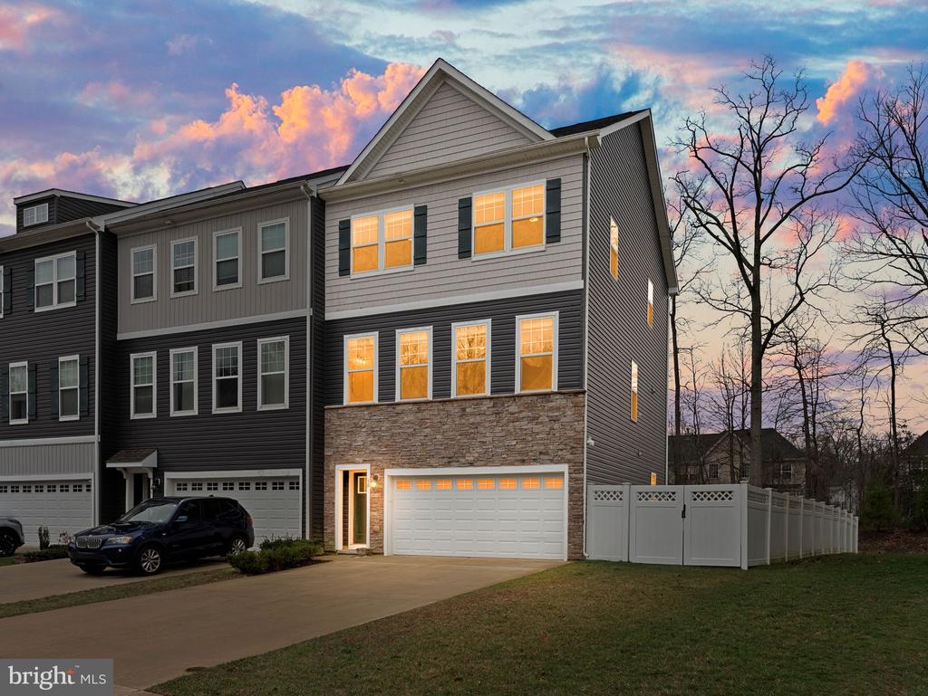 Welcome to 38 Sullivan Way in the highly sought after Berkshire Woods neighborhood. A rare end-unit townhome built in 2018 offering 3 levels of thoughtfully designed living space, 3 bedrooms, an upgraded 3 full and 1 half baths, and an outdoor setup that is hard to find in this community. With 2,457 sq ft, 9-foot ceilings on every level, brand new carpet, and a highly functional layout, this home combines space, flexibility, and privacy in a way that stands out. The main level is bright, open, and built for both everyday living and entertaining, featuring hardwood flooring, recessed lighting, a spacious living area, and an expansive kitchen with oversized island, granite countertops, dark cabinetry, stainless steel appliances, and access to the main-level deck with pergola. Upstairs, the primary suite features a recessed tray ceiling, large walk-in closet, and upgraded bath with double vanity, soaking tub, separate shower, and private water closet. Two additional bedrooms, a full hall bath, and upper-level laundry complete the top floor. The finished lower level adds exceptional versatility with a large bonus living space, full bath, walkout access to the backyard, and interior access to the attached garage, ideal for a rec room, home office, gym, guest space, or media room. Outside, the expansive fenced yard, detached shed, and wooded backdrop create a rare combination of usable outdoor space and added privacy. All of this in a highly convenient Marlton location close to shopping, dining, and major commuting routes. Join us for Open Houses Saturday 3/28 and Sunday 3/29 from 11 AM to 1 PM before it is too late!