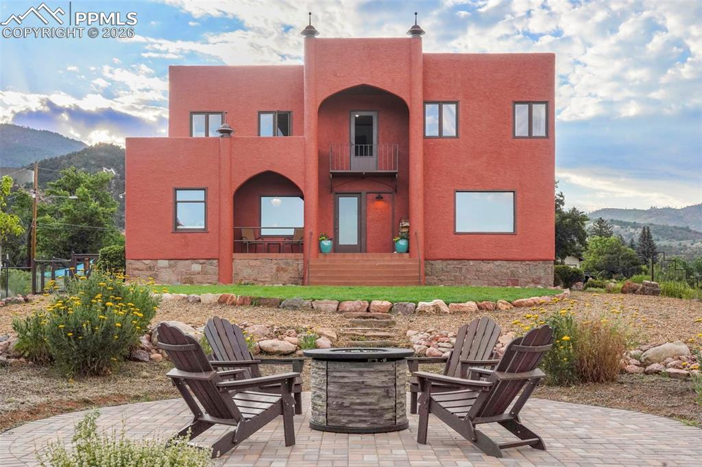 ******VIEWS VIEWS VIEWS AND EXTRA LARGE LOT****** This is your chance to make a move on one of the most unique properties in Colorado. Magnificent Historic Moroccan-Style Home with 360° Views in Manitou Springs! This is a once-in-a-lifetime opportunity to own a piece of history in the heart of Manitou Springs! Perched on a hilltop with breathtaking 360° views, this extraordinary Moroccan-style home combines charm, beauty, and warmth with a rich sense of history and character. THE PROPERTY SITS ON A LARGE SUB DIVIDABLE LOT (2 MORE POSSIBLE), offering immediate income potential for future development. Whether you dream of creating additional residences, a guest retreat, or simply enjoying the serenity and wildlife of your own private sanctuary, the possibilities are endless. Inside, you’ll find architectural details reminiscent of Moroccan elegance, complemented by panoramic windows that flood the home with natural light and showcase the surrounding mountains and valley below. Features you’ll love: ** Historic charm with Moroccan-inspired design ** Unmatched 360° mountain and city views ** Large subdividable lot for future income opportunities or expand your personal domain** Wildlife and natural beauty all around ** Rare opportunity in highly desirable Manitou Springs Don’t wait—homes like this don’t come around often! Schedule your private showing today and experience the magic for yourself."SOLD AS IS"