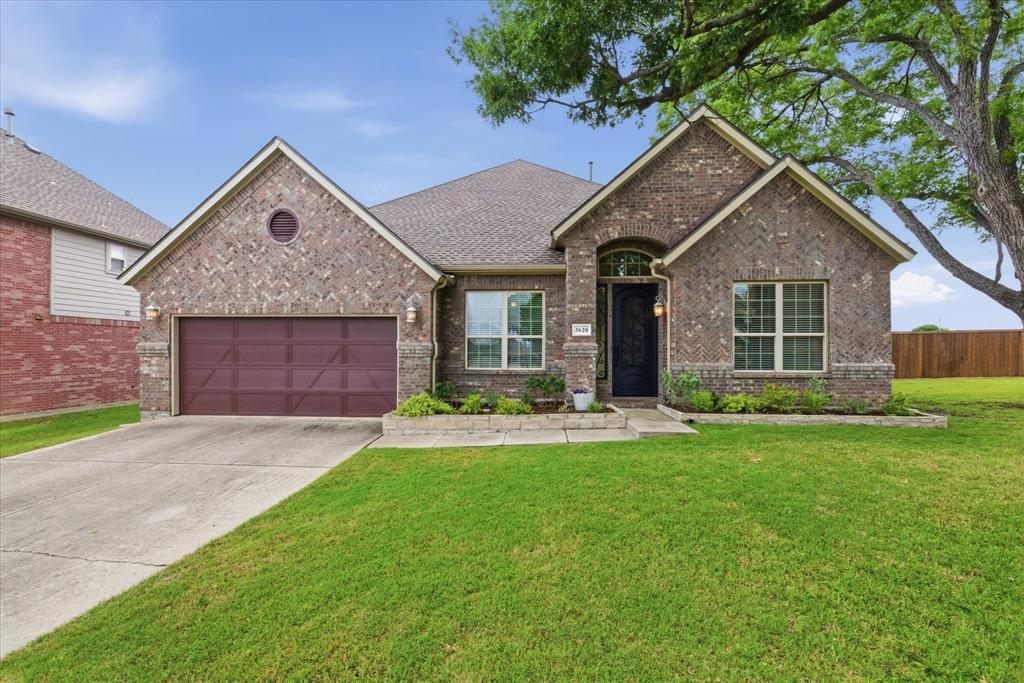 Stunning single-story home offering nearly 2,700SF on an oversized third-acre lot in Villas at Stoney Hollow. From the moment you arrive, the exceptional quality & attention to detail are evident beginning with the custom wrought iron & glass front door that creates an impressive first impression. Inside, the flexible & thoughtfully designed floorplan provides both functionality & elegance for everyday living & entertaining. Just off the entry is a spacious 2nd living area that also makes the perfect home office, study, or flex space. At the front of the home are 2 generously sized guest bedrooms with a shared full bathroom, creating an ideal layout for family or visitors. The heart of the home is the expansive kitchen featuring granite countertops, large center island, bar seating, gas cooktop, double ovens, built-in microwave, walk-in pantry, and abundant cabinetry. The  breakfast nook flows seamlessly into the open family room with wood floors, cozy fireplace, and an impressive wall of windows overlooking the backyard. The private primary suite is a peaceful retreat complete with wood floors overlooking the backyard. The primary bathroom was updated in 2024 & features a huge frameless glass shower, updated tile, dual vanities, jetted tub, and spacious walk-in closet. A rare second primary suite is situated on its own private wing of the home and includes tile flooring, ensuite bathroom, and walk-in closet, making it ideal for multigenerational living, guests, game room, or media room. Step outside to the fenced backyard with plenty of grassy play space & enough room to add a pool, trampoline, or outdoor living area. Major updates include roof and fence replaced in 2024. Exceptional location within walking distance to Plano East High School as well as Bob Woodruff, Oak Point & Stoney Hollow Parks offering miles of walking and biking trails, creeks, lakes, and outdoor recreation. Conveniently located just minutes from Highway 75, shopping, dining & entertainment.