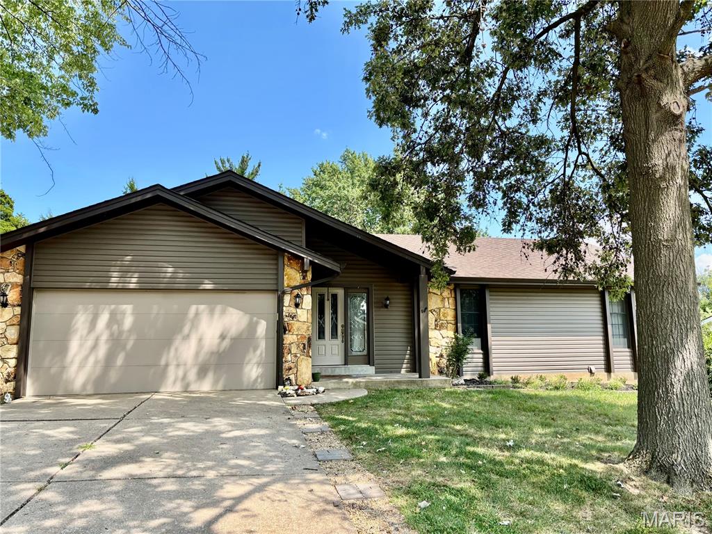 Professional Photos Coming Soon!  Wonderful 3-bedroom, 3-bathroom ranch located in the desirable Park Charles neighborhood! This home has been lovingly maintained and is ready for a new family to enjoy! The new owners will love the open floor plan with great room with wood burning fireplace, kitchen/dining room combination with access to the expansive multi-level deck that is perfect for entertaining. The primary bedroom has a large custom walk-in closet, updated primary bathroom with heated floors and private access to the deck/back yard. The main floor has two additional bedrooms and a second full bathroom. Wait, there is more! The partially finished lower level has a spacious family/recreation room, two additional sleeping spaces/offices, a third bathroom and a large laundry/storage area. This home has recent updates (2023) including the roof, gutters, siding, carpet and paint. The garage also has an epoxy floor for a great look and easy cleanups. This neighborhood has multiple lakes perfect for enjoying some fishing or quiet reflection. The location is close to major highways and amenities and within the highly rated Francis Howell school district. Don’t miss this one!