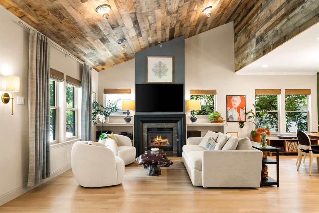 Located in the heart of the coveted M Streets, this East Dallas gem has been completely renovated in 2024 with over $100K of thoughtful updates. The stunning kitchen and bathrooms were taken down to the studs and reimagined with all new appliances, custom cabinetry, quartz countertops, designer tile, modern lighting, and sleek finishes. All windows in the home have been replaced, filling the interiors with natural light and energy efficiency. Outside, enjoy a brand-new cedar fence, electric gate with alley access, and freshly paved driveway. A new composition roof with a transferable warranty through 2034 was installed in 2019, as well as a new HVAC – replaced with a 5 ton Trane unit, including ductwork. In addition to the updates, this home has 2 living spaces, 3 spacious bedrooms and 2.5 baths. This home is truly move-in ready, blending modern upgrades with the timeless charm of one of Dallas’s most beloved neighborhoods.