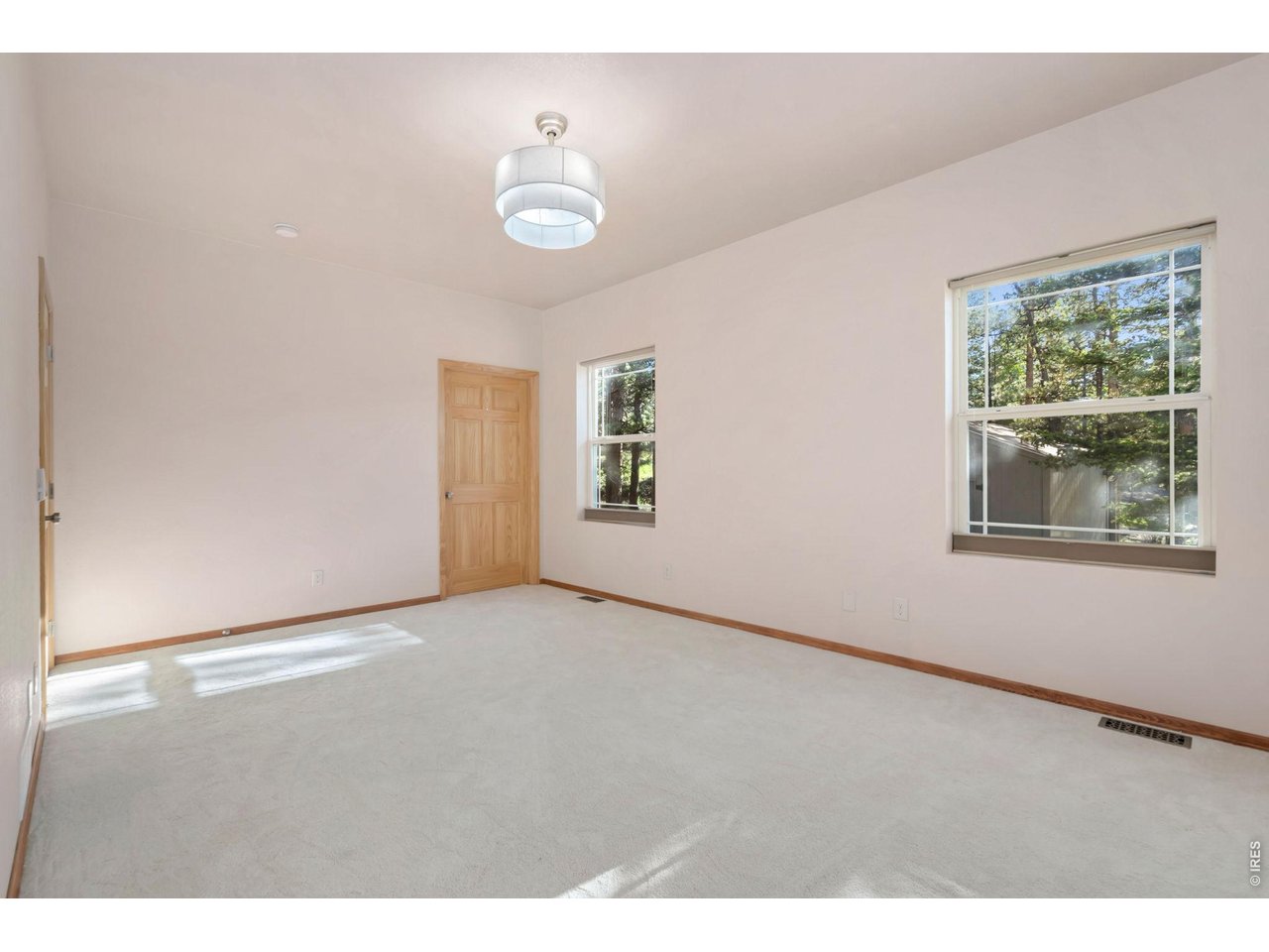Your own private, stocked pond with a waterfall right outside your door! This mountain retreat sits on nearly an acre surrounded by nature, local wildlife, and peaceful water views that make every day feel like a getaway. A custom-built house with unmatched attention to detail, this single-level home offers three bedrooms and showcases meticulous craftsmanship throughout, with every inch thoughtfully designed for both comfort and style. Inside, you are welcomed by vaulted ceilings and large picture windows that fill the main living area with natural light and stunning views, while a stone propane fireplace serves as the centerpiece. The kitchen comes equipped with stainless steel appliances, custom hickory cabinetry, quartz-composite countertops, a breakfast bar, ample prep space, and a pantry for organized storage. All bedrooms include walk-in closets, and the bathrooms feature heated floors and skylights. The primary suite stands out with an ensuite bathroom that features a heated bidet and custom floor tile. A dedicated laundry room/mud room includes a new smart washer and dryer. Outside, a wraparound deck provides front-row views of your private water feature, visiting wildlife, and the annual fireworks, while a covered patio provides the perfect setting for relaxing or entertaining. A large outbuilding offers extra utility or storage, while two RV parking areas with electric hookups add flexibility for guests or travel needs. The home is also equipped with integrated Starlink internet, effortless smart voice control via Alexa, a built-in security system for added peace of mind, and wired stereo. In addition to your waterfront property, enjoy access to four nearby lakes, with optional membership for fishing across eight private lakes throughout the community. You'll also love being just a short distance from The Village for local shopping and dining, offering a balance of privacy and accessibility in a truly unique mountain setting. Full feature sheet available!