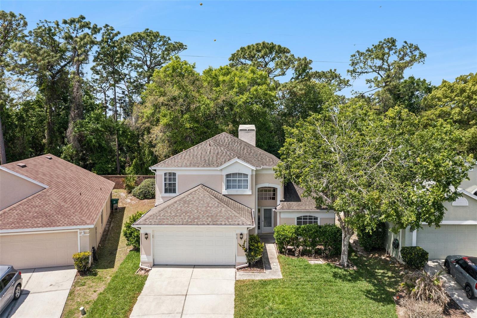 Manderley community of Lake Mary! This beautifully designed two-story home offers 3 bedrooms, 2.5 bathrooms, a 2-car garage, and approximately 1,952 square feet of comfortable living space. Inside, you’ll find a spacious layout featuring a welcoming living room with fireplace, separate dining area, eat-in kitchen, and a generously sized kitchen complete with stove, refrigerator, microwave, and dishwasher. Upstairs, a versatile loft provides the perfect space for a home office, media area, or additional living space. Flooring throughout includes a blend of laminate, tile, and carpet. Additional highlights include an inside utility room with dryer included, a screened patio ideal for relaxing, and a fenced backyard offering privacy and room to enjoy the outdoors. Conveniently located near shopping, dining, major roadways, and top Lake Mary amenities.
