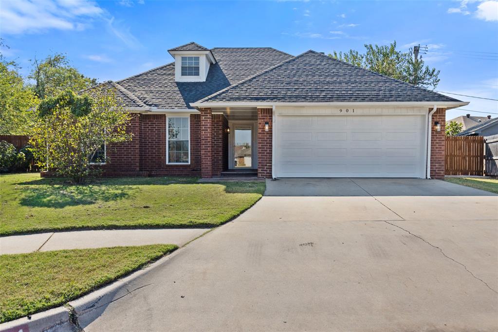 Welcome to this beautifully remodeled 4-bedroom home in the heart of Moore! Featuring 3 bedrooms downstairs and a versatile upstairs room that can serve as a 4th bedroom, office, playroom, or more, this home offers plenty of flexibility for any lifestyle. The inviting living room showcases a beautiful fireplace as its centerpiece, creating a warm and cozy atmosphere. The kitchen has been fully updated with quartz countertops, stainless steel appliances, and modern finishes throughout. The primary suite includes a private door leading to the backyard, creating a perfect retreat. Step outside to enjoy the spacious backyard complete with a covered porch and open deck — ideal for relaxing or entertaining. Conveniently located near shopping, dining, and top-rated Moore schools, this home has it all!