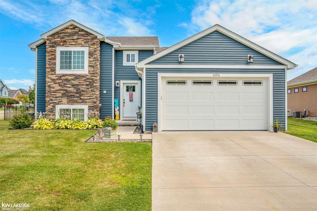 Built in 2022, this stunning 3-year-old bi-level home still feels brand new! Located on a corner lot in the peaceful and sought-after Summerwood subdivision, it features vaulted ceilings, a spacious open layout, and a beautifully upgraded kitchen with quartz countertops, subway tile, and stainless steel appliances. The primary suite offers a walk-in closet and a luxurious custom tile shower. Enjoy a large fenced backyard, a back deck for relaxing, and a roomy laundry area with a utility sink . Low HOA covers snow removal, and common area maintenance. Just steps from the community pond and Taylor Creek Stables, and minutes from Davison schools, Sugarbush Golf Club, and downtown. Don't miss this move-in ready gem-schedule your showing today!  OPEN HOUSE SAT. & SUN 12-3