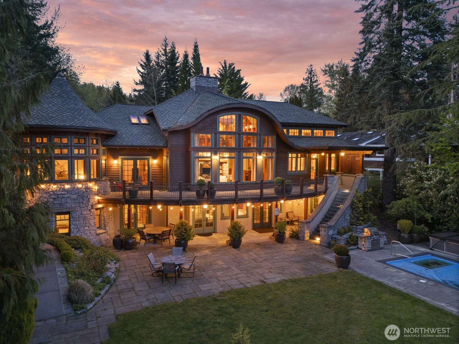 Introducing the Crown Jewel of Lake Whatcom: an architectural masterpiece blending Old World elegance with exceptional custom craftsmanship. This 6,800 sq. ft. home boasts 5 beds, 5 baths, a great room with soaring curved ceilings, and a remodeled 2-bed guest house. Located on 100' of sunny South-facing shoreline, features include a pool, private beach with dock & boathouse, and stunning terraced landscaping. The owner’s suite is a turret design, and the home includes priceless recycled timber beams, granite walls, a 3 bay shop/garage and a 2 car garage for all your toys and workspace! More than just waterfront—this is a Moceri built icon! An estate with this degree of privacy is a rare find and sure to deliver lasting memories!