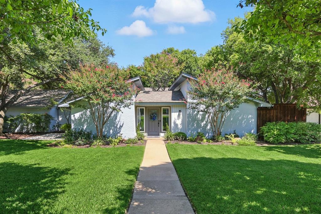 Welcome to this beautiful home in the Mont Del Estates, perfectly situated near shops, restaurants and with easy access to major highways. Set on a nicely sized lot with mature trees and wonderful curb appeal, this transitional-style home is filled with natural light thanks to a central atrium that seamlessly connects the indoors with the outdoors.

The home has been lovingly updated throughout. There are two spacious living areas, three bedrooms and two bathrooms. The main hub of the home is the updated kitchen, featuring quartz counters, a breakfast bar, stainless steel appliances and gas range. It opens to the family room, complete with built-in desk and cabinetry, and easy access to a backyard deck perfect for entertaining. The primary suite is a true retreat with sliding doors to a patio and a beautifully updated ensuite bath offering dual vanities, dual sinks, a large walk-in shower, and walk-in closet.

Additional highlights include luxury vinyl plank flooring, a tankless water heater, gated drive and a two-car garage. Updated throughout with today’s modern conveniences, this gem is move-in ready!