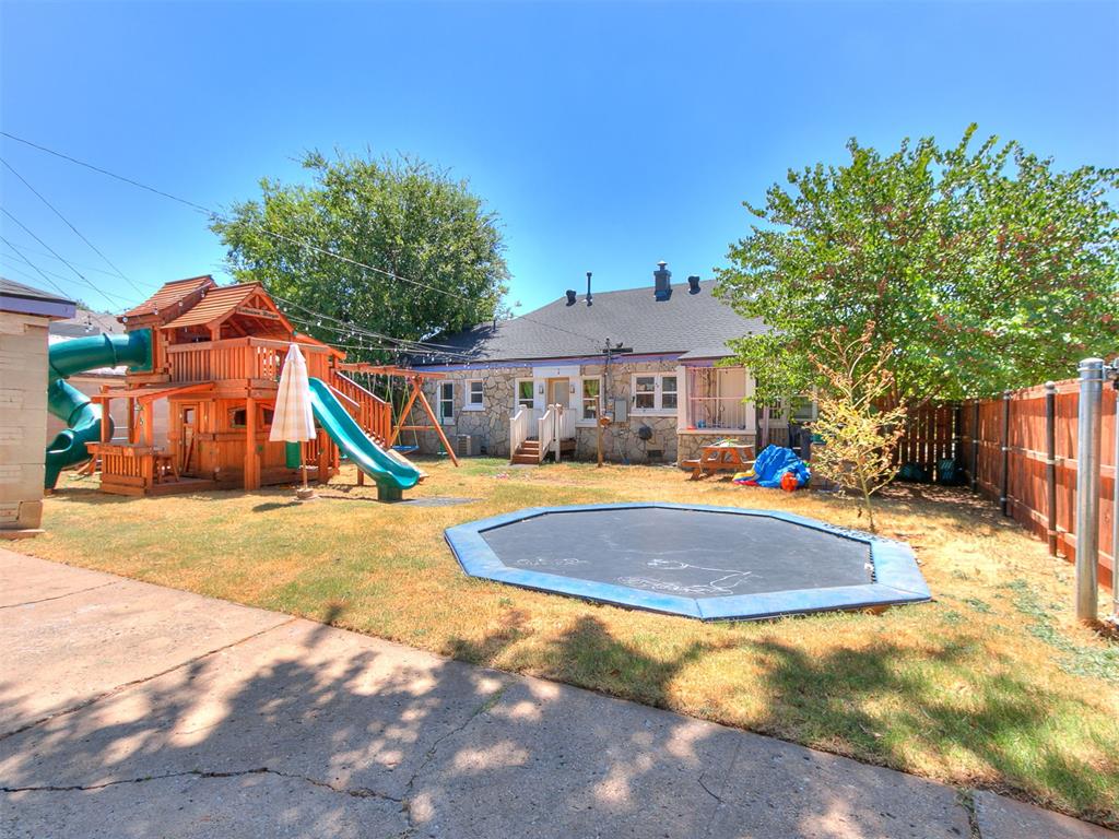 Beautifully remodeled 3-bedroom, 3-bathroom home conveniently located near the Plaza District and all that OKC has to offer. Thoughtfully renovated with quality and character throughout, this home features beautiful flooring, a spacious kitchen with custom cabinetry, a 6-burner gas range, large pantry, and stunning island. Multiple updated bathrooms provide modern finishes while maintaining the charm of the original home. The enclosed front porch offers additional flexible space, while the large, fully fenced backyard and gated driveway provide privacy and convenience. Additional updates include a newer roof, HVAC, plumbing, electrical, gas lines, tankless water heater, and sewer line. A rare opportunity to own a beautifully updated home in a vibrant and highly desirable central OKC location!