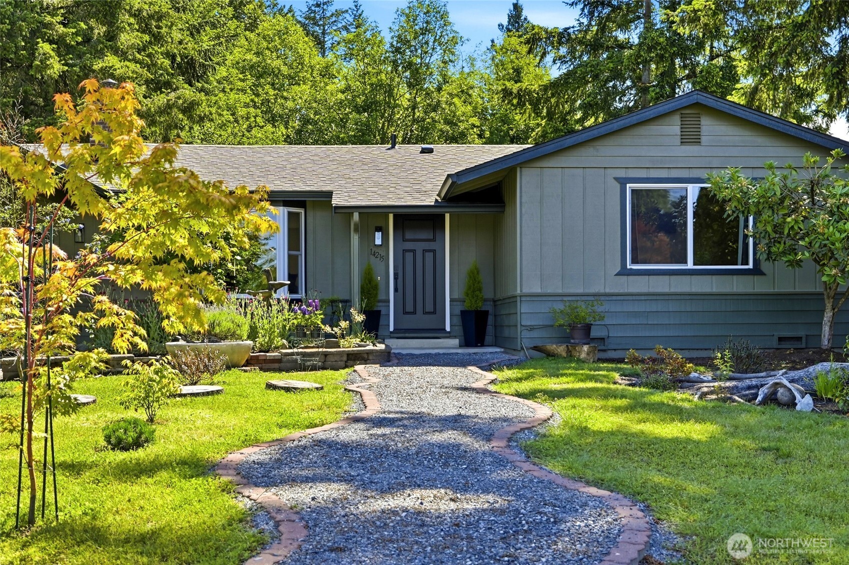FEELS LIKE YOU’RE COMING HOME! Rare Marysville Rambler Exudes Privacy, Updates & Natural Beauty! Tucked away on .61 acres, this stunning single-story retreat welcomes you with thoughtful updates from the moment you arrive. Stroll up the whimsical front walkway and enjoy the sweet landscaping! At the heart of the home, a showstopper kitchen features granite countertops, stainless appliances, and a generous island-all flowing seamlessly into a sun-filled eating area with a bay window. Cozy up by the fireplace or gather in the spacious LIVING room, complete with a propane stove for efficient supplemental heat. (Go Hawks-your screams & cheers are safe here!) 3 well-appointed bedrooms and 1.75 beautifully updated baths round out the interior. Step outside onto the updated deck and let your imagination take over — lush, peaceful grounds, a meandering creek(THIS PROPERTY HAS CREEKFRONT), and incredible bird watching create a private oasis unlike anything else in this price range. Perfect for those neighborhood ball games AND creekside fun! The backyard delivers serious function too: a 12x24 shop with loft(fully insulated), two additional sheds, and potential RV parking. Major updates include a roof-(~7 years old), exterior paint-$7,000(2024), new front door-$3,000, new kitchen-$38,000 and a new electrical pane-$7,000(with space to add on eg. Swim Spa), Bay Window-$5,000, Deck-$15,000-the big-ticket items are already done! This is the one-level lifestyle you've been waiting for.