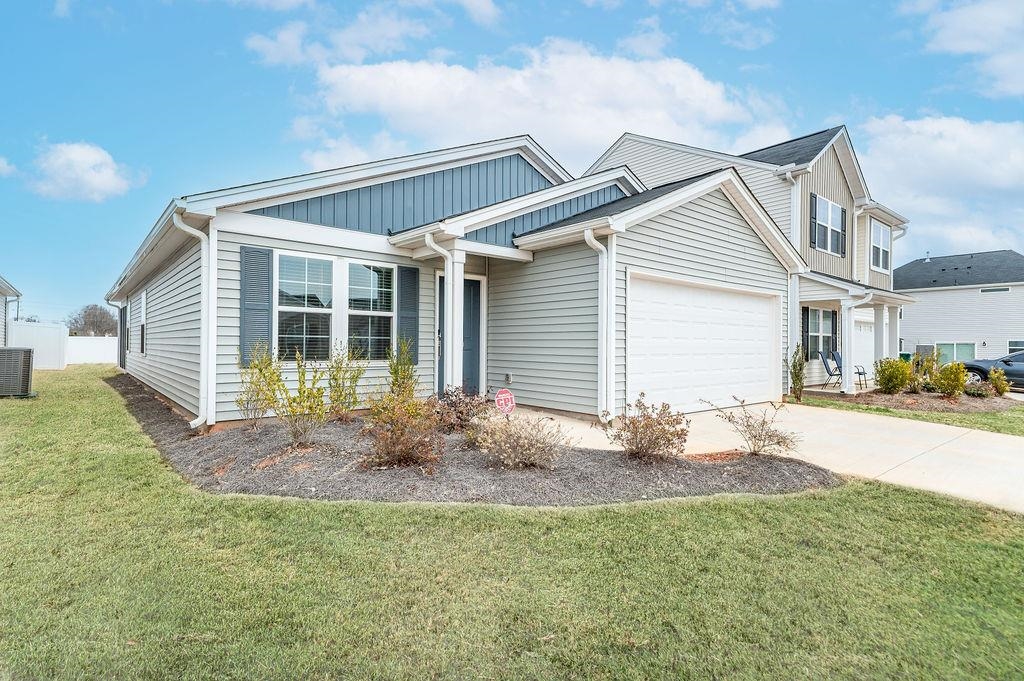 Exceptional Value Just Got Even Better! A recent seller PRICE ADJUSTMENT has created an outstanding opportunity to own this beautiful home at an exceptional value! Competitively priced for today's market, this property offers the perfect combination of quality, location, and affordability.  "Owner relocation created this rare opportunity to own an almost-new home at an exceptional value! Just 18 months old, this like-new home offers modern finishes, energy-efficient construction, and low-maintenance living—all priced below the cost of building new.  Seller invested over $6,000. in a beautiful enclosed sunroom, creating a bright, year-round living space perfect for relaxing, or entertaining and adding value to the home! Inside, you'll find an open-concept floor plan with luxury vinyl plank flooring, upgraded cabinetry, quartz countertops throughout, and a spacious primary suite featuring dual vanities, a garden tub, and subway tile shower. The refrigerator, washer, and dryer (less than one year old) are included, along with a security system, making this home truly move-in ready. Conveniently located near shopping, dining, schools, and beautiful Lake Bowen. Don't miss this opportunity to own a move-in-ready home with valuable upgrades already completed at an exceptional price. Schedule your showing today and see why this opportunity won't last long!