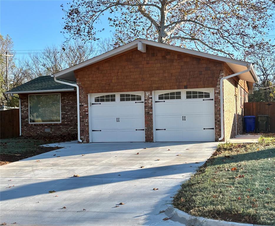 Updated home approximately one mile from campus.  This 3 bedroom, 2 bath home with a 2 car garage has been updated throughout (See full list of amenities in supplements).  Kitchen has new cabinets/counter top and remodeled to open up to a nice size living room.  Wood floors have been refinished.  Both bathrooms have been completely remodeled.  Primary bath has rain shower, tile, shower/floor and countertop with cooper sink.  Hall bathroom has new shower, tile and vanity with cooper sink.  Driveway replace (2025), Windows (2017), Newer window treatments and Newer garage doors.  Large fenced back yard.